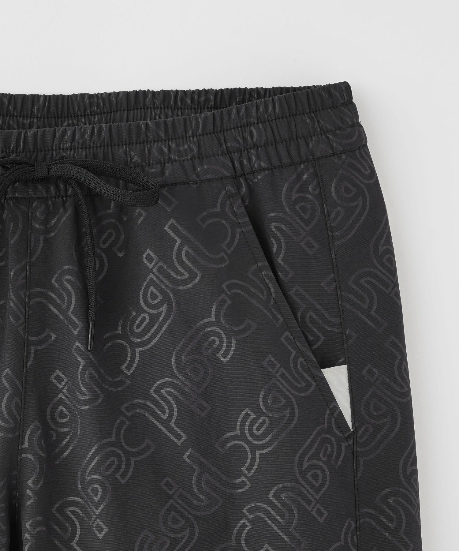 EMBOSSED WIND UP PANTS