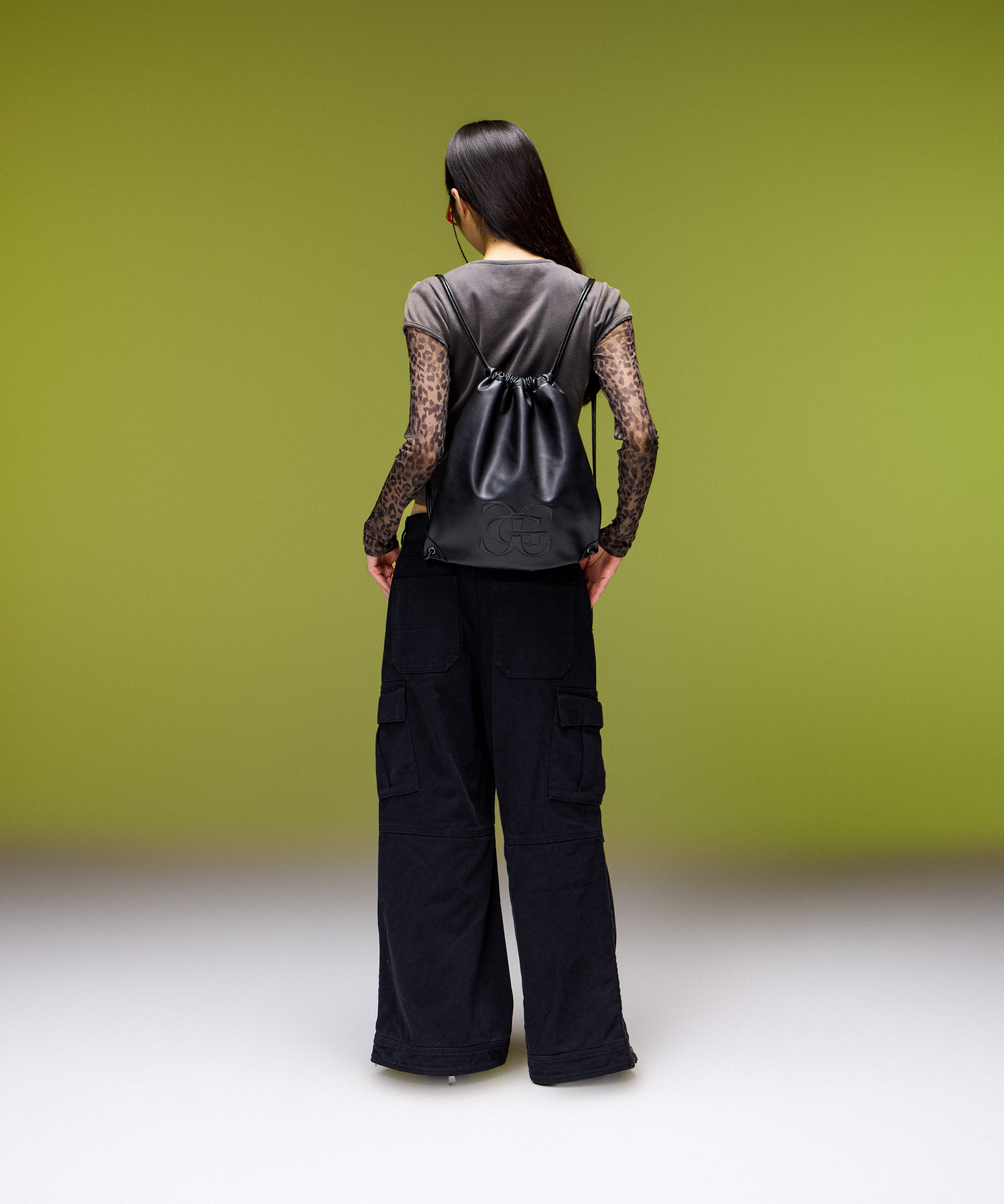 XG EMBLEM FAUX LEATHER KNAPSACK