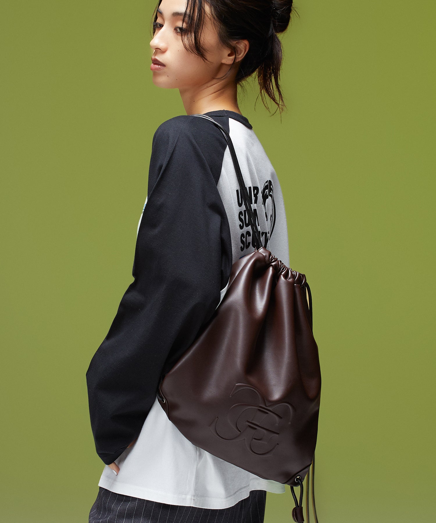 XG EMBLEM FAUX LEATHER KNAPSACK