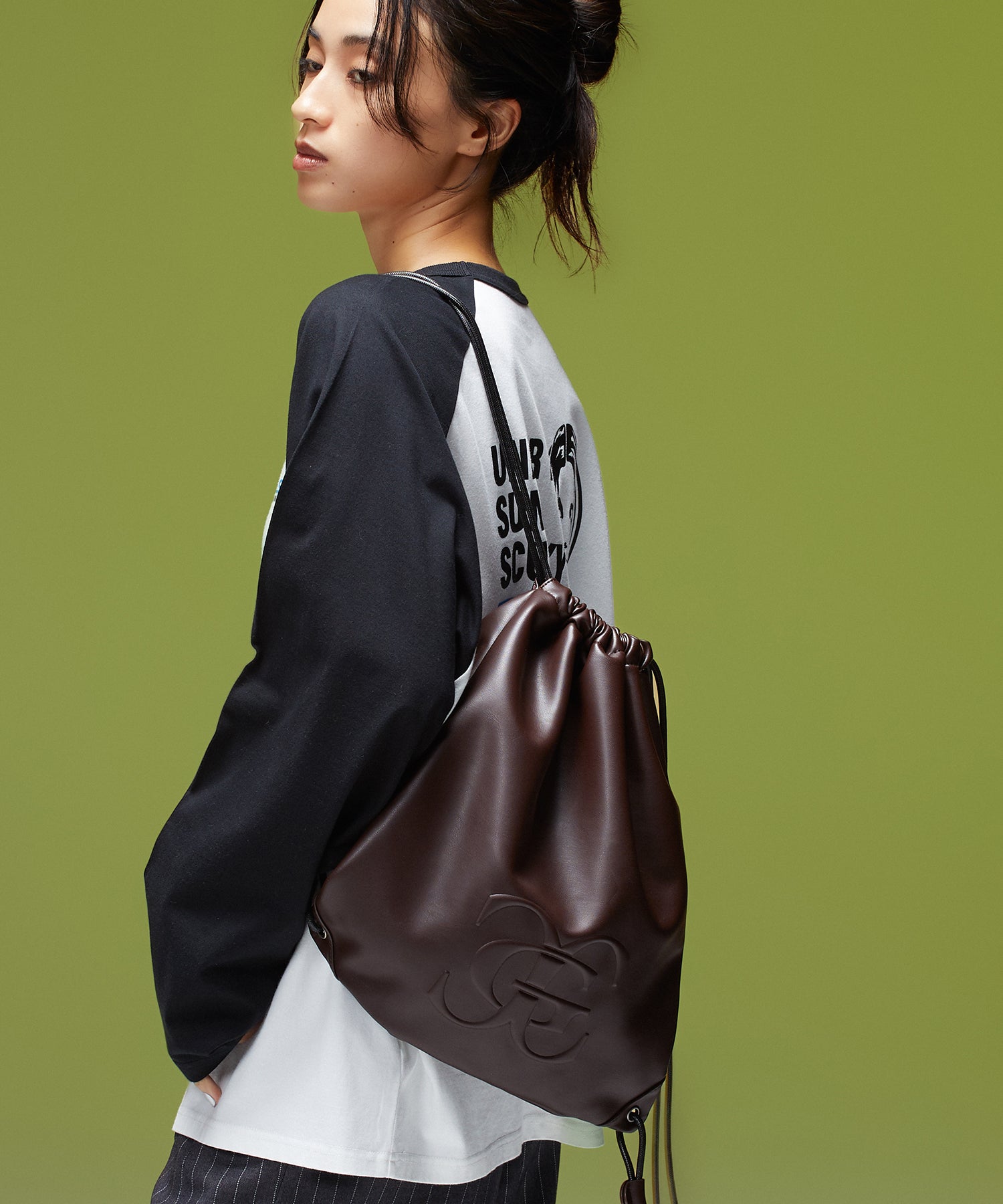 XG EMBLEM FAUX LEATHER KNAPSACK