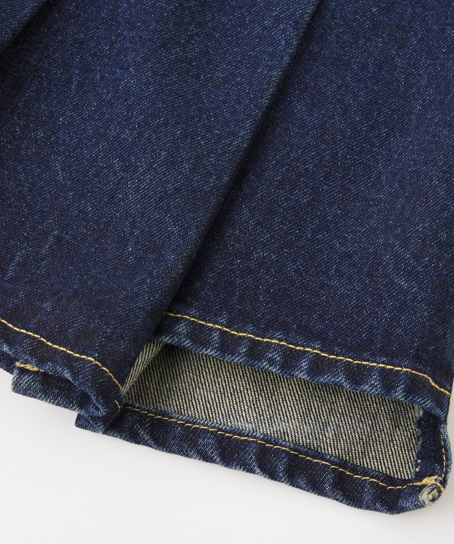 PLEATED DENIM MINI SKIRT