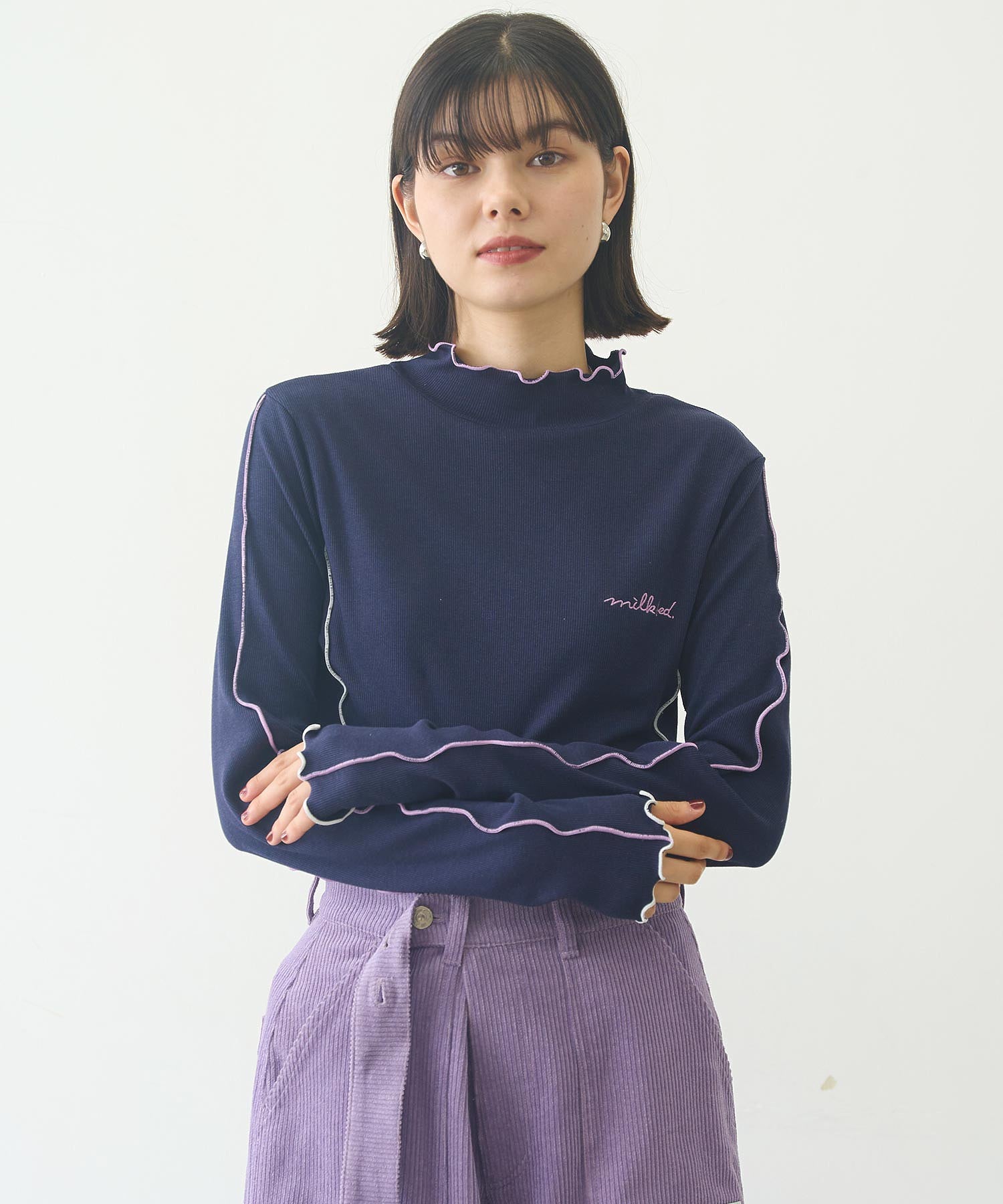 OVERLOCK STITCHED TOP