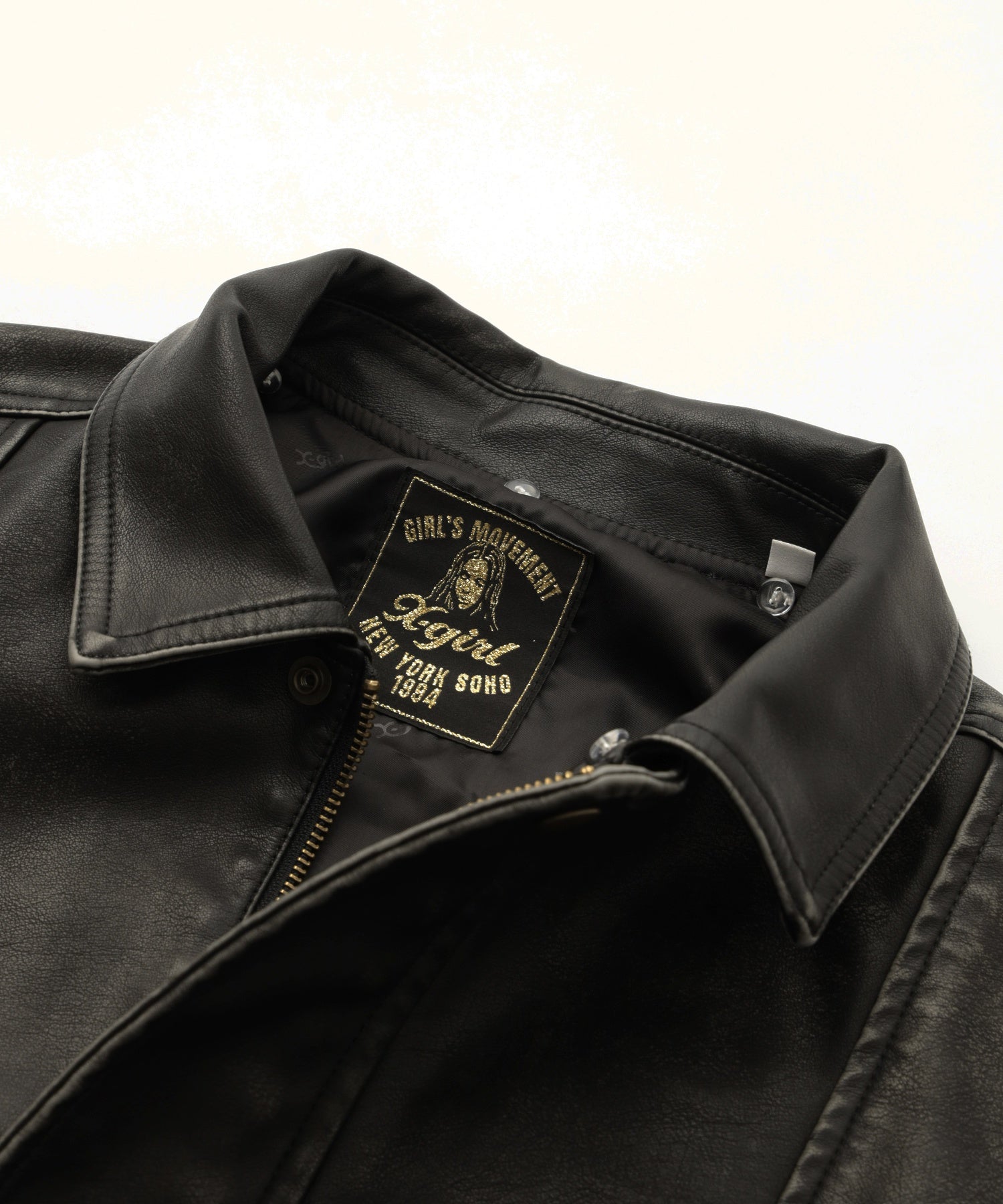 EMBOSSED LOGO PATCH DISTRESSED FAUX LEATHER JACKET