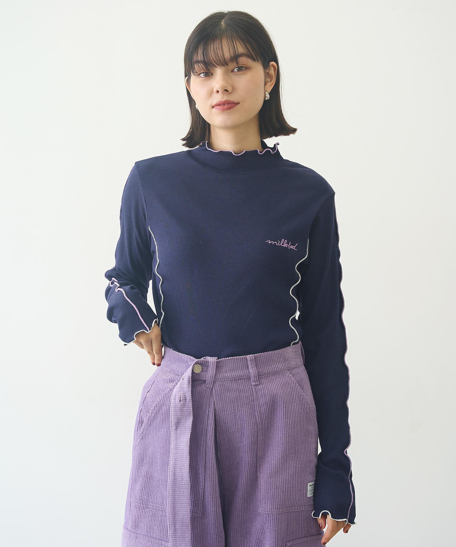 OVERLOCK STITCHED TOP