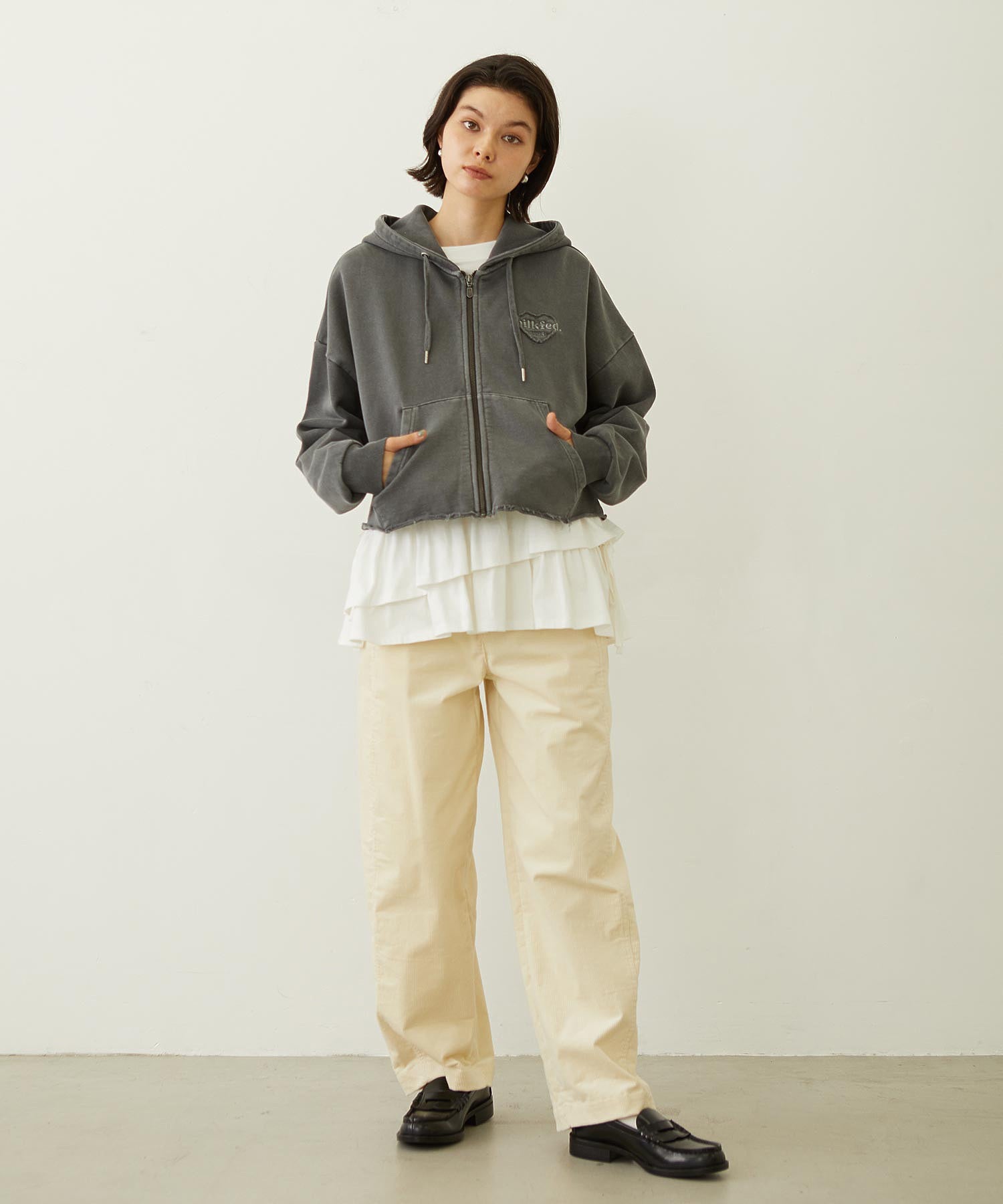 ASYMMETRIC FRILL TOP