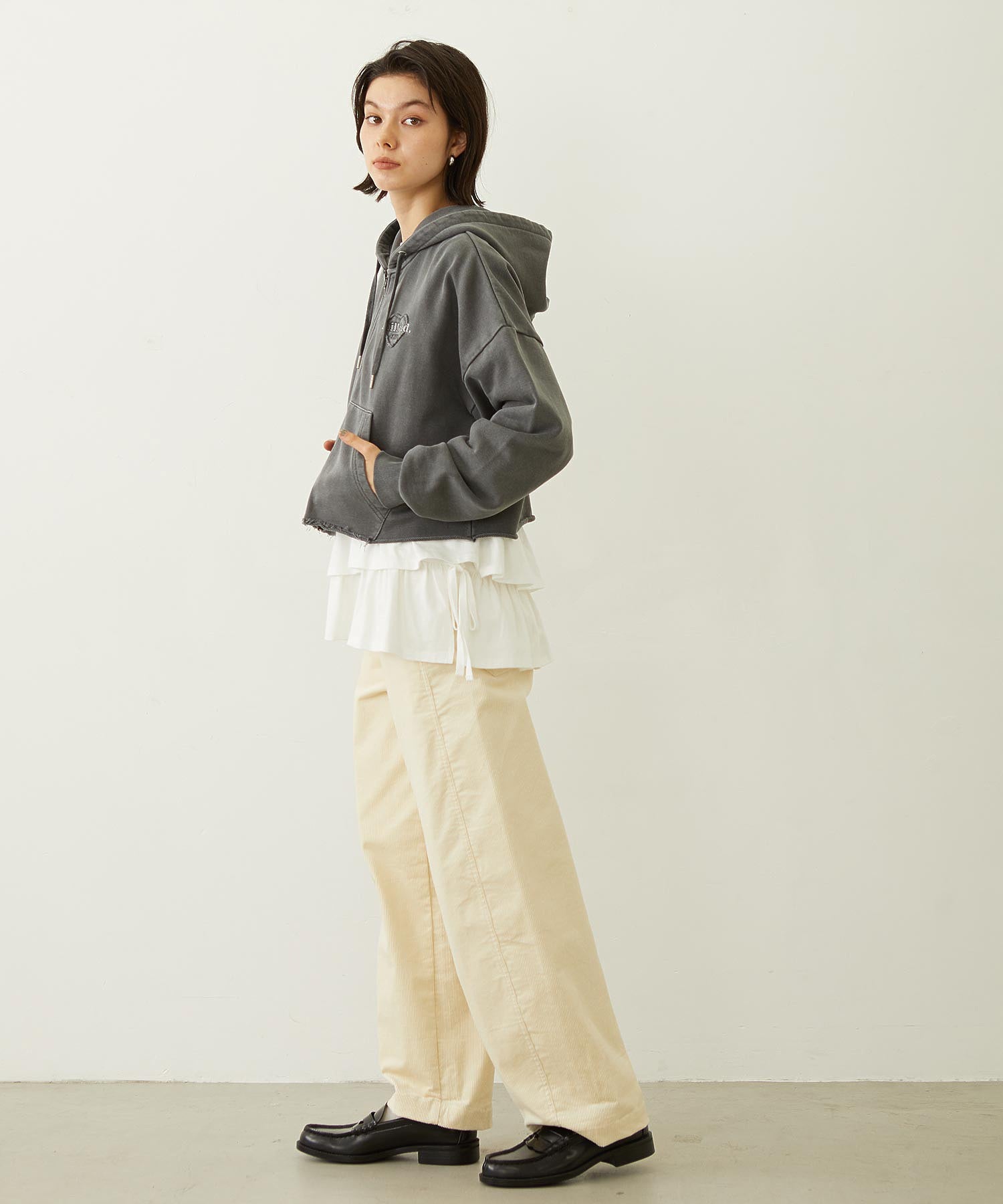 ASYMMETRIC FRILL TOP