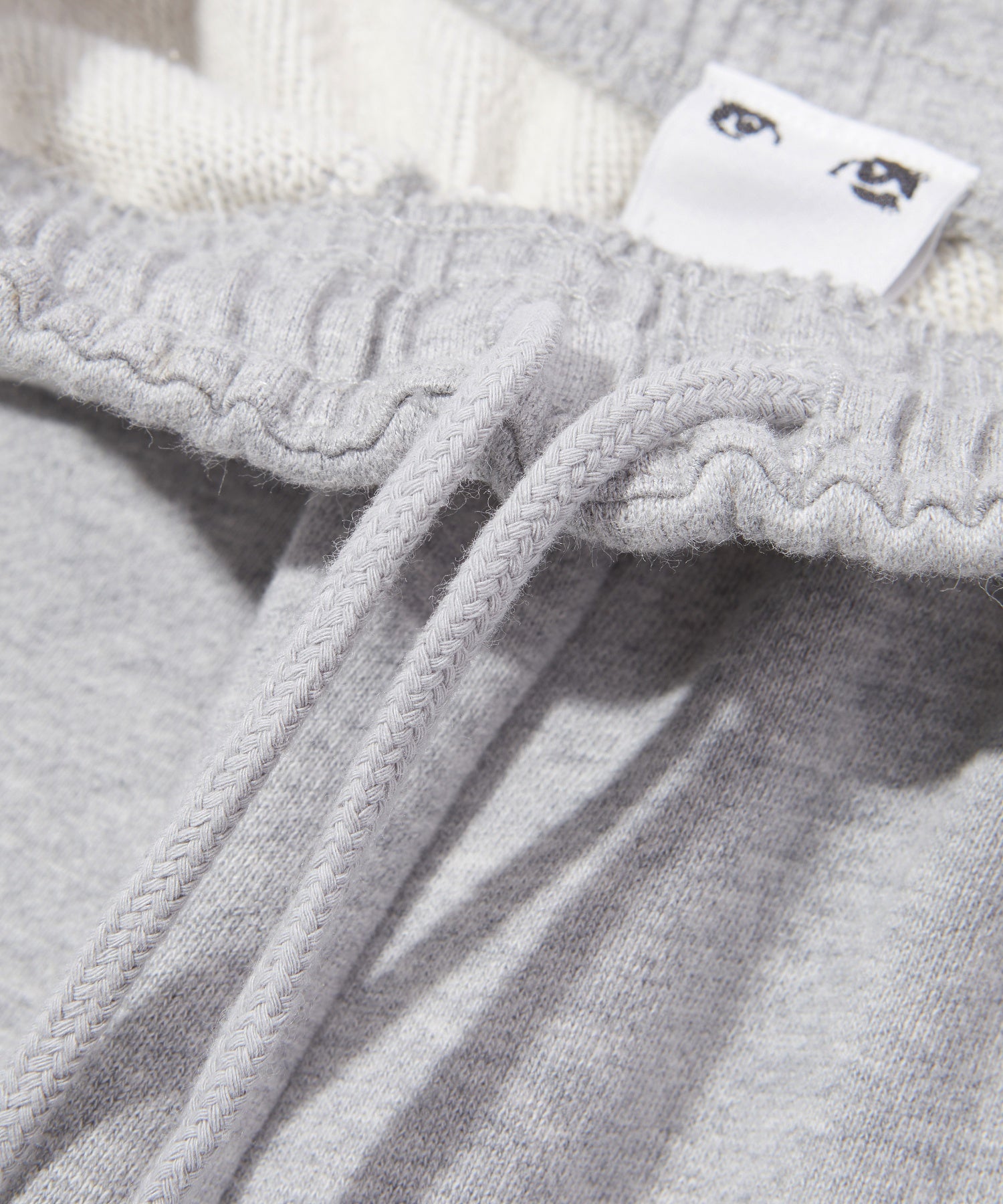 LAYERED DISTRESSED SWEATPANTS