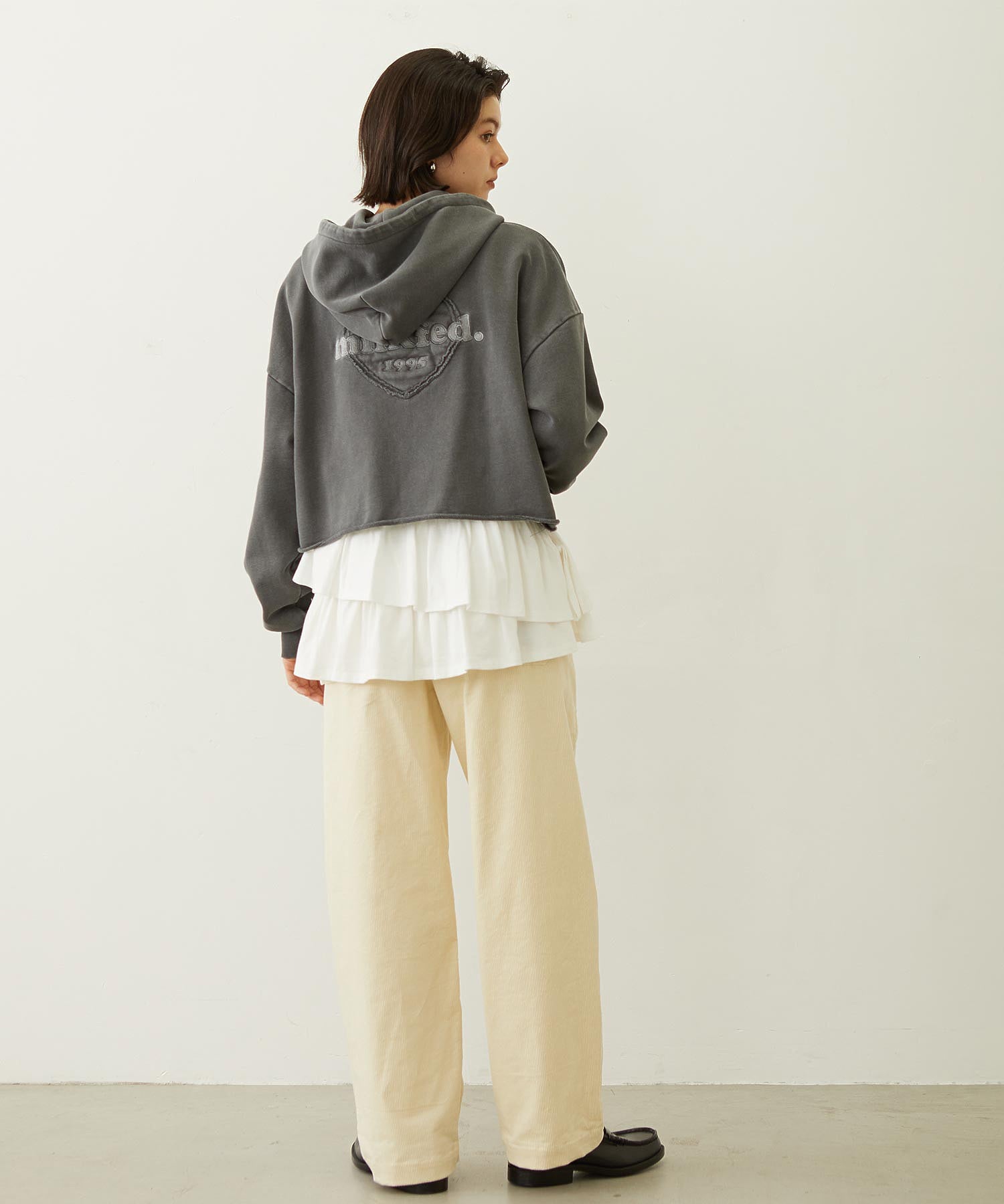 ASYMMETRIC FRILL TOP