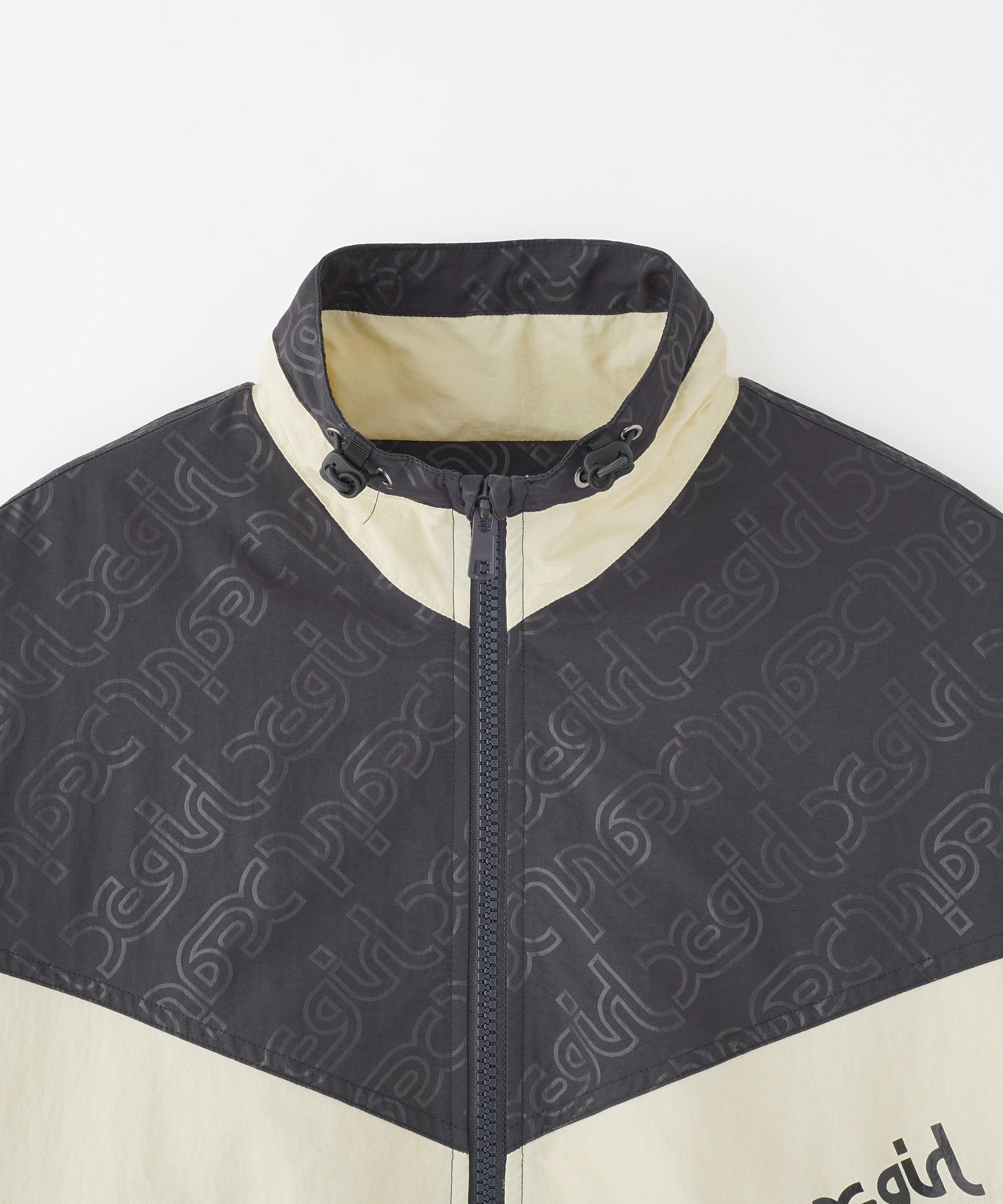 EMBOSSED WIND UP JACKET