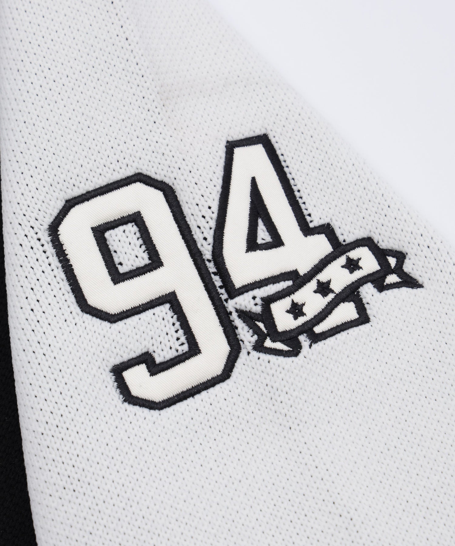 PATCH AND JACQUARD STADIUM KNIT JACKET