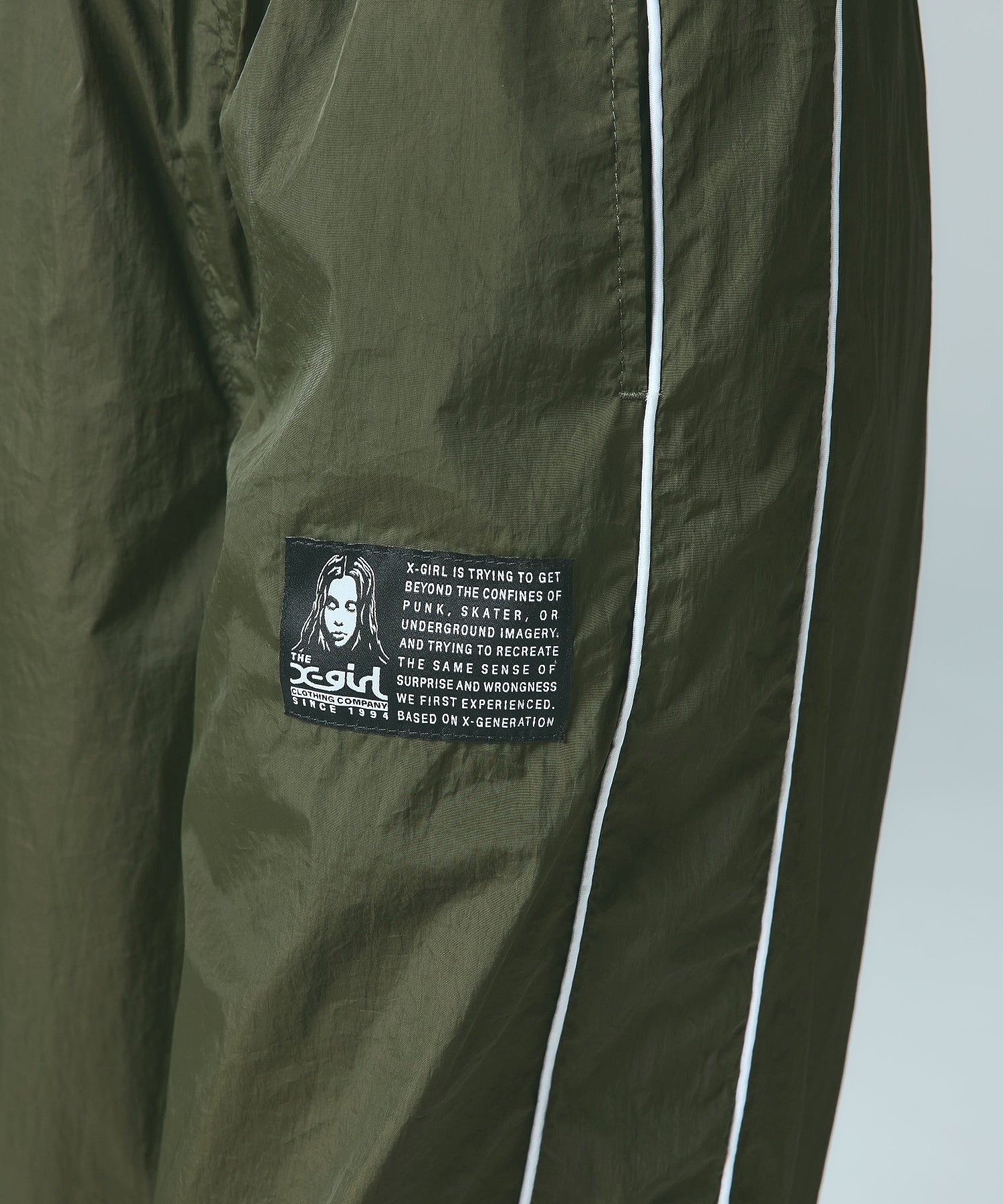 FACE LABEL TRACK PANTS