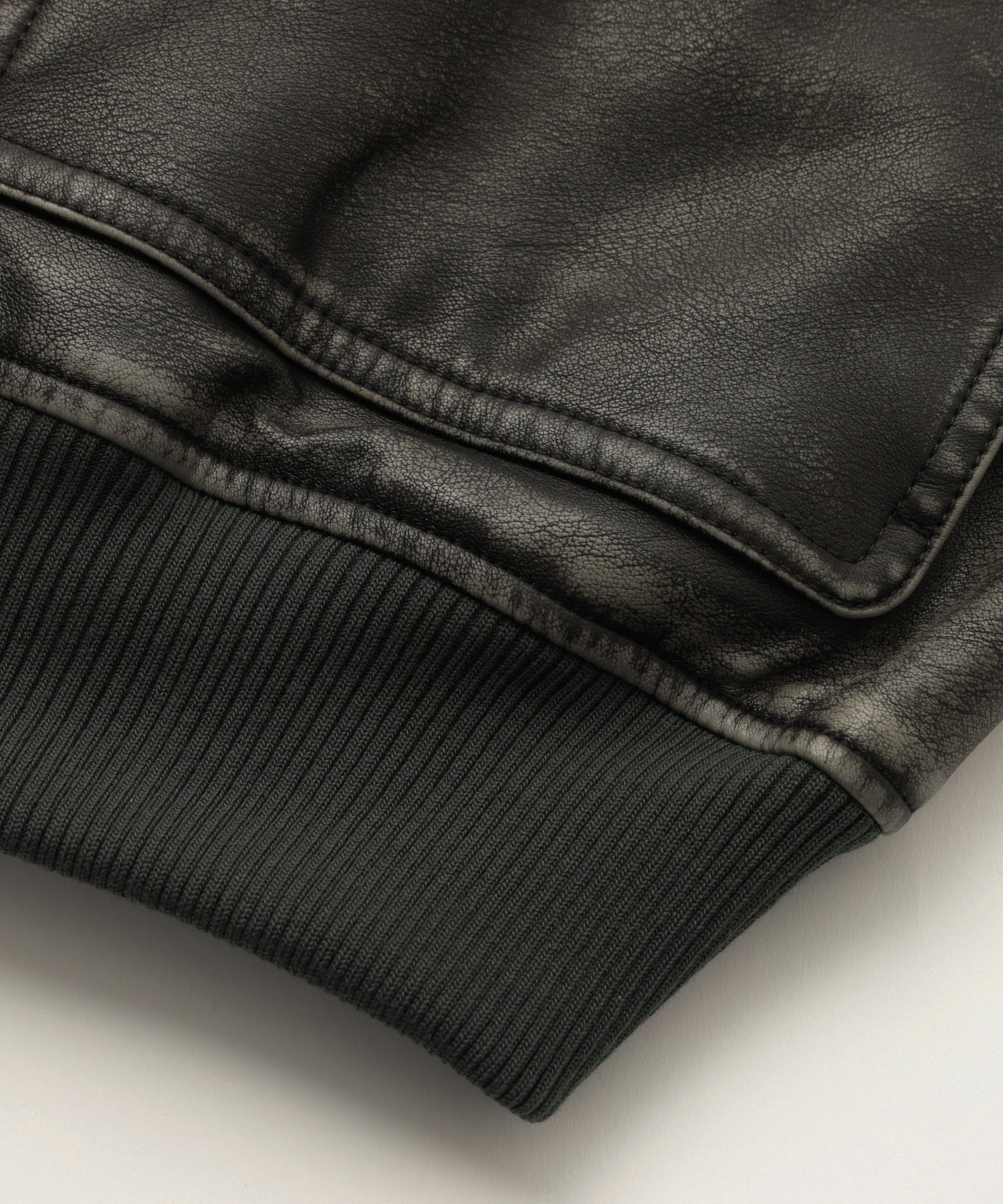 EMBOSSED LOGO PATCH DISTRESSED FAUX LEATHER JACKET