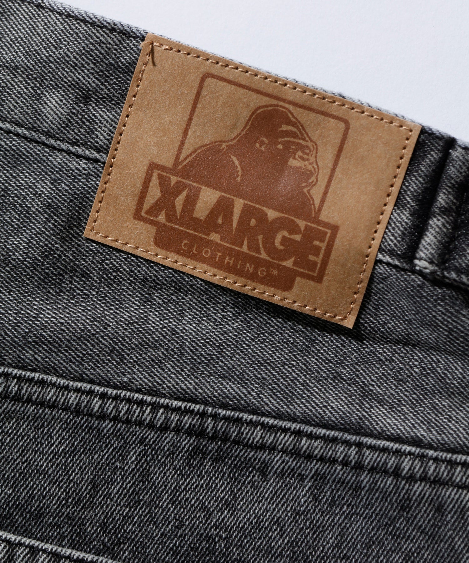 EMBOSSED DENIM PANTS
