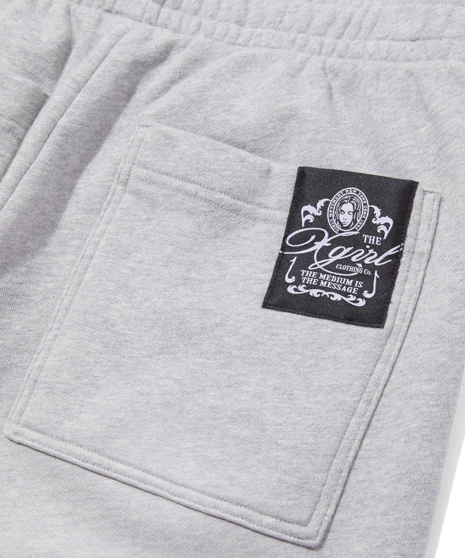 LAYERED DISTRESSED SWEATPANTS