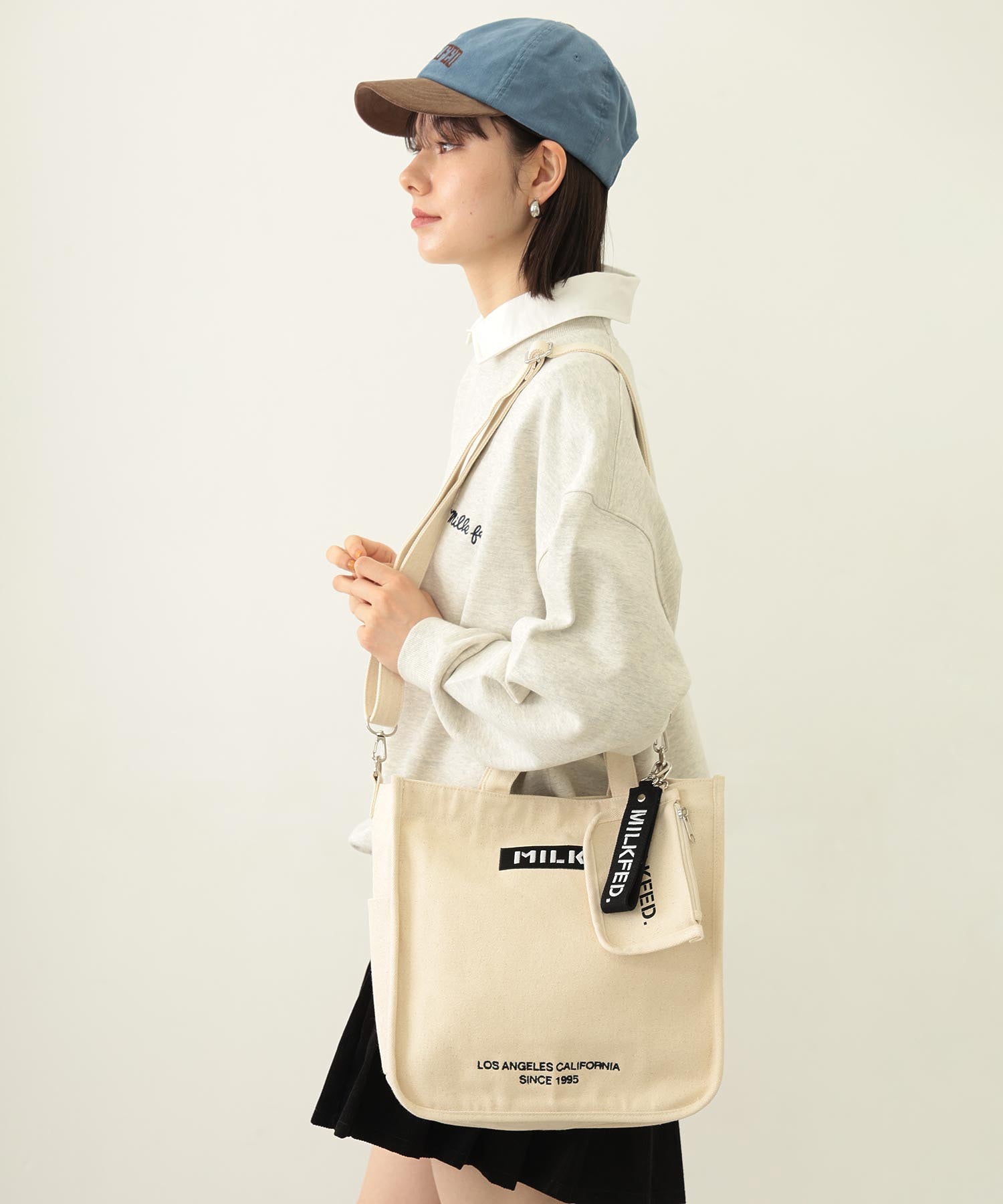 EMBROIDERED BAR SHOULDER BAG W/STRAP MILKFED.