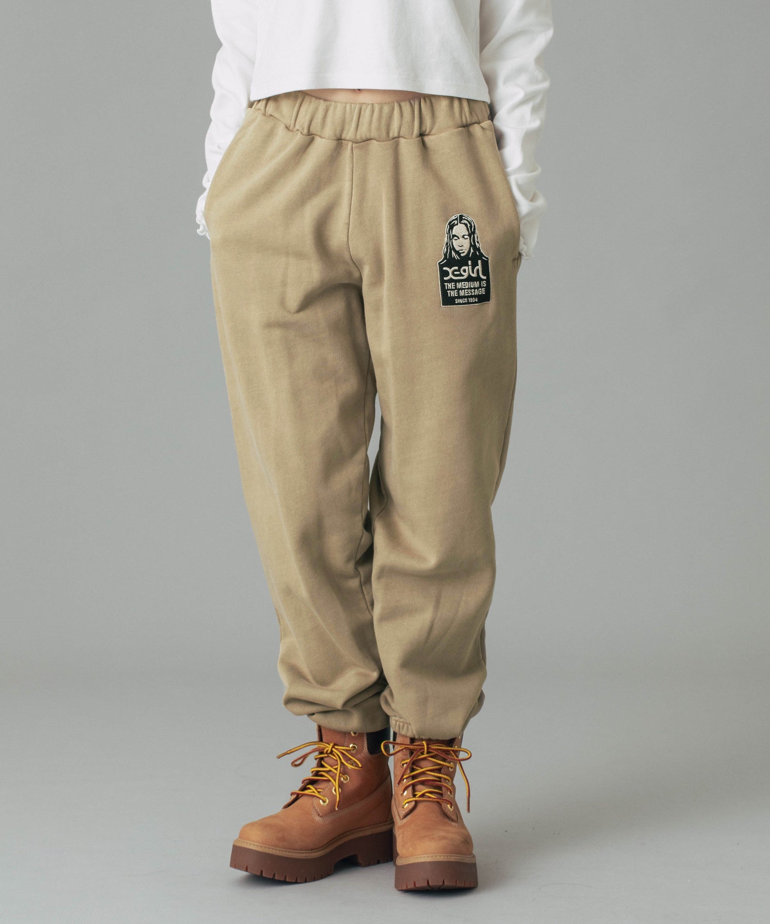 MESSAGE AND FACE PATCH FADED SWEAT PANTS