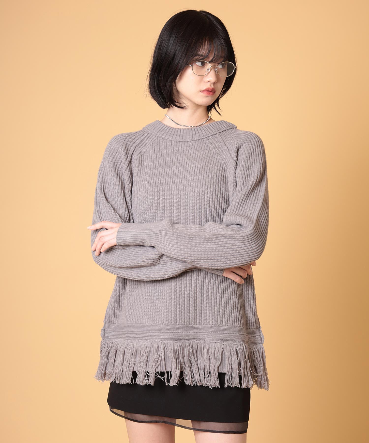 オーバーサイズフリンジニットプルオーバー