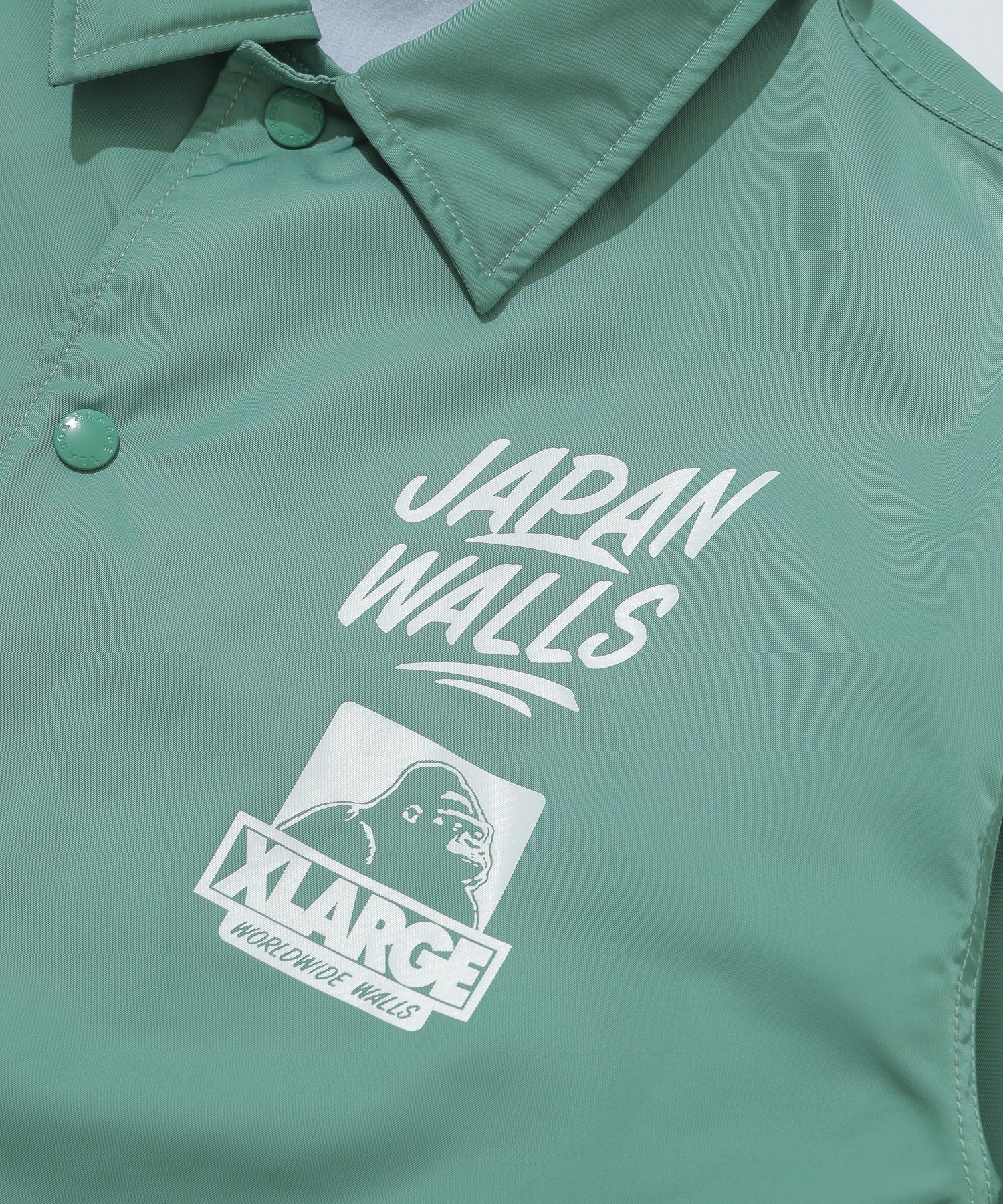 XLARGE×JAPAN WALLS 2024 COACHES JACKET calif-ART