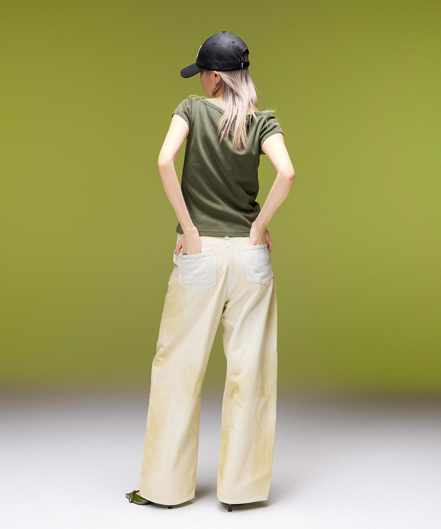 EMBLEM POCKET ASYMMETRIC WAIST DENIM PANTS