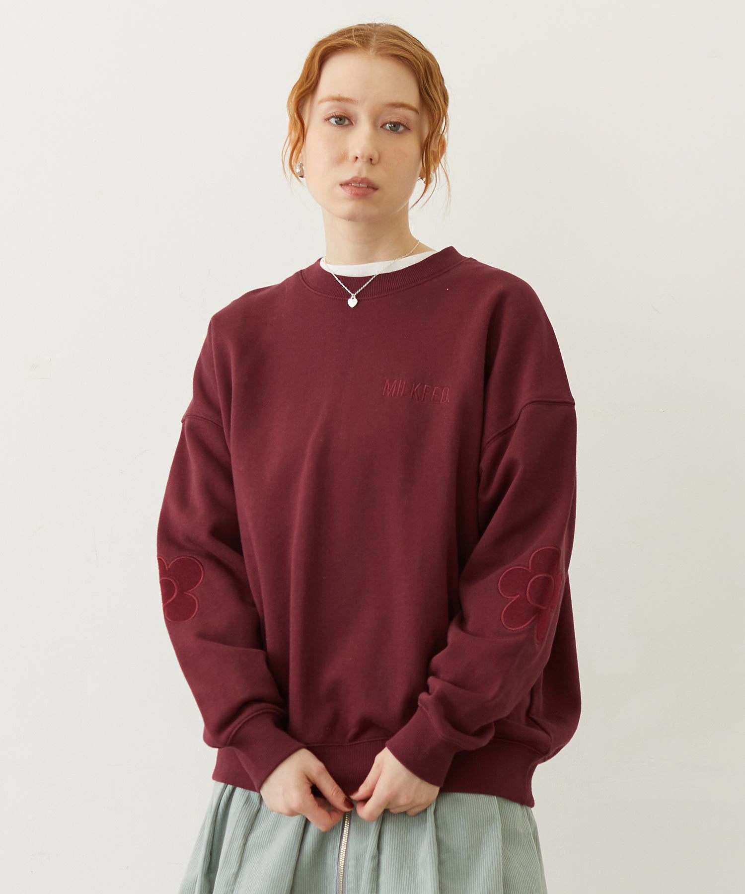 FLOWER ELBOW PATCH SWEAT TOP