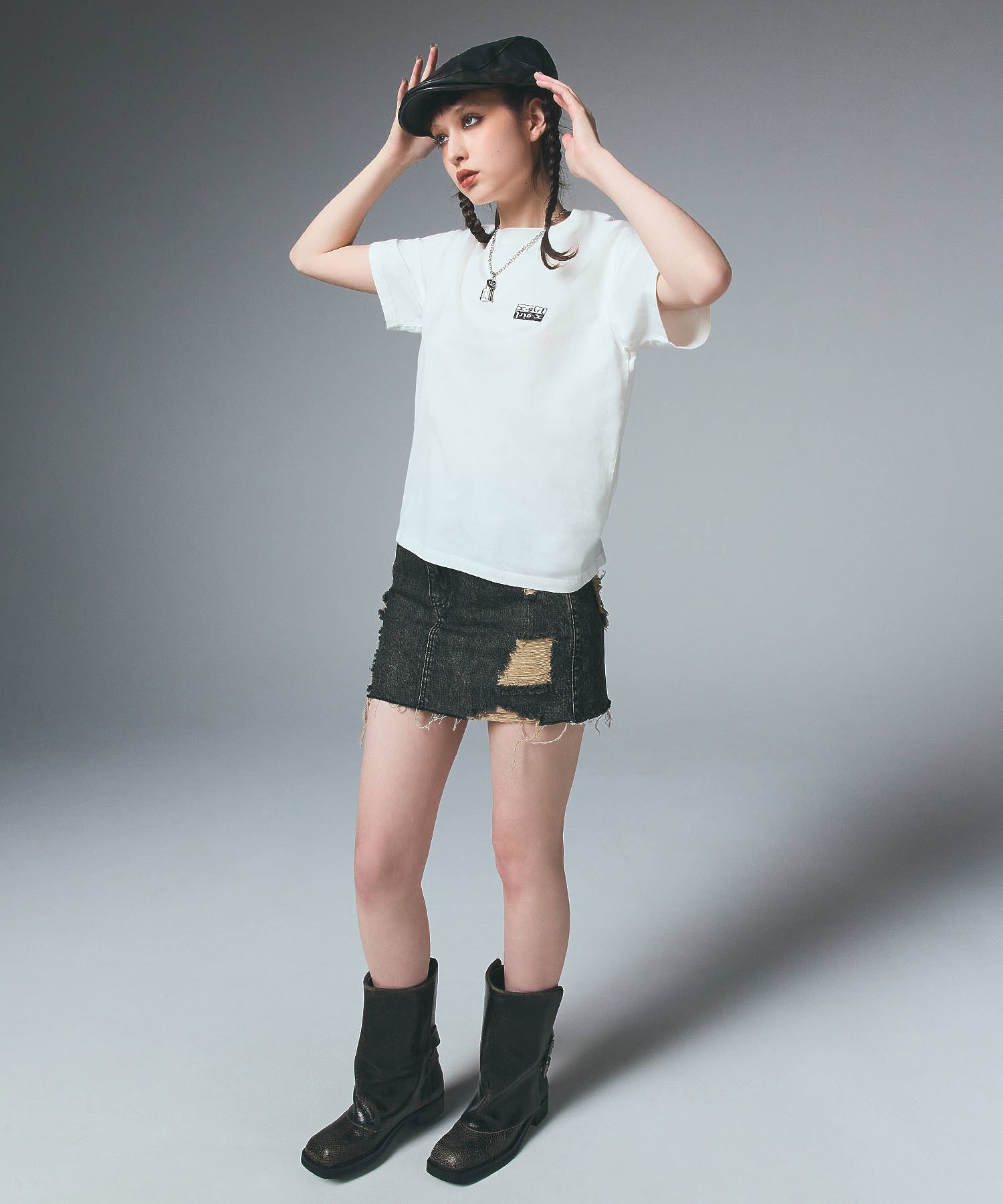 DISTRESSED DENIM MINI SKIRT