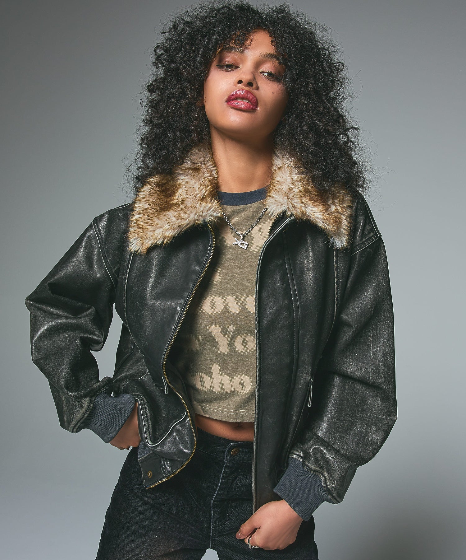 EMBOSSED LOGO PATCH DISTRESSED FAUX LEATHER JACKET