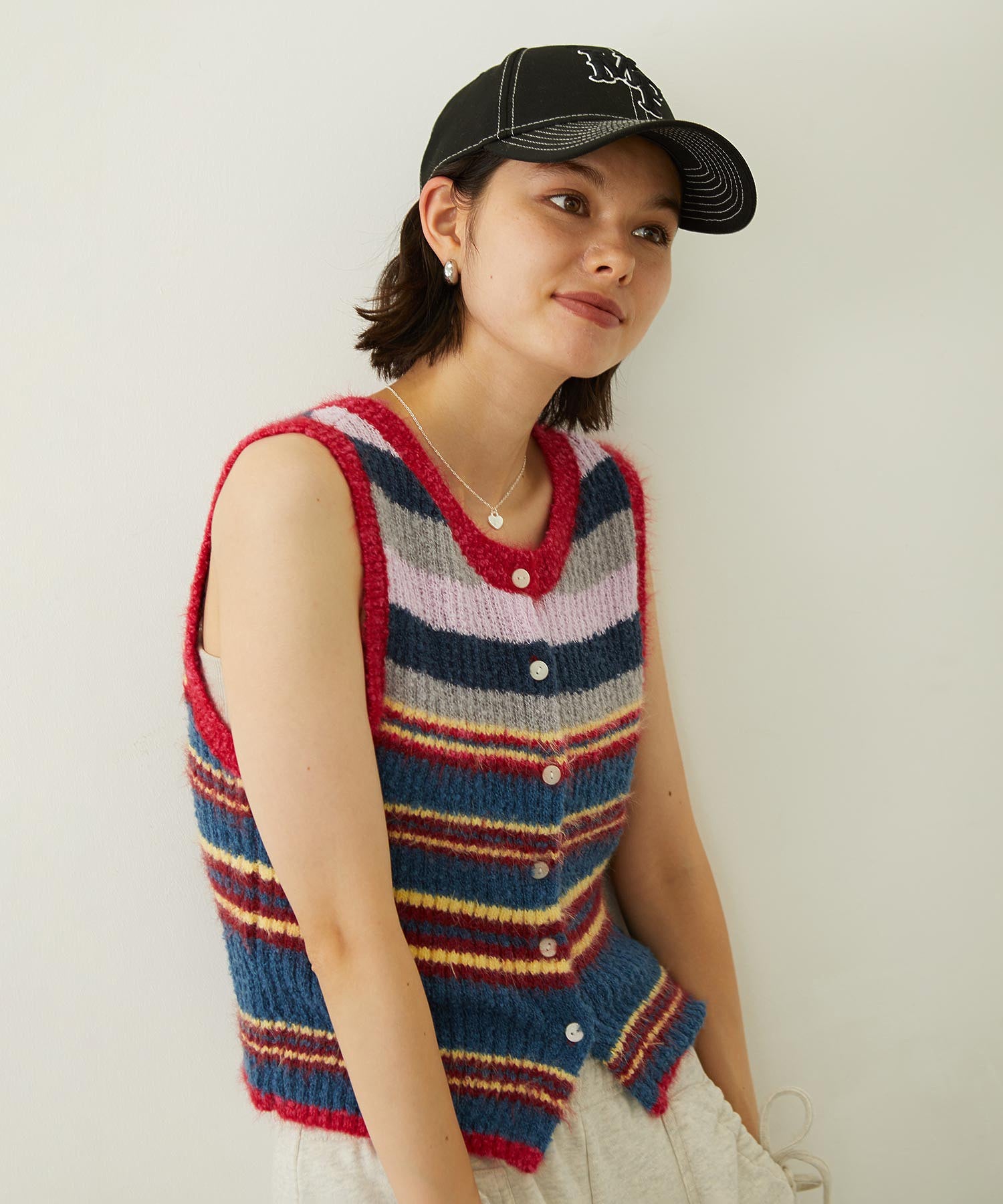 TWO-TYPE STRIPED KNIT VEST