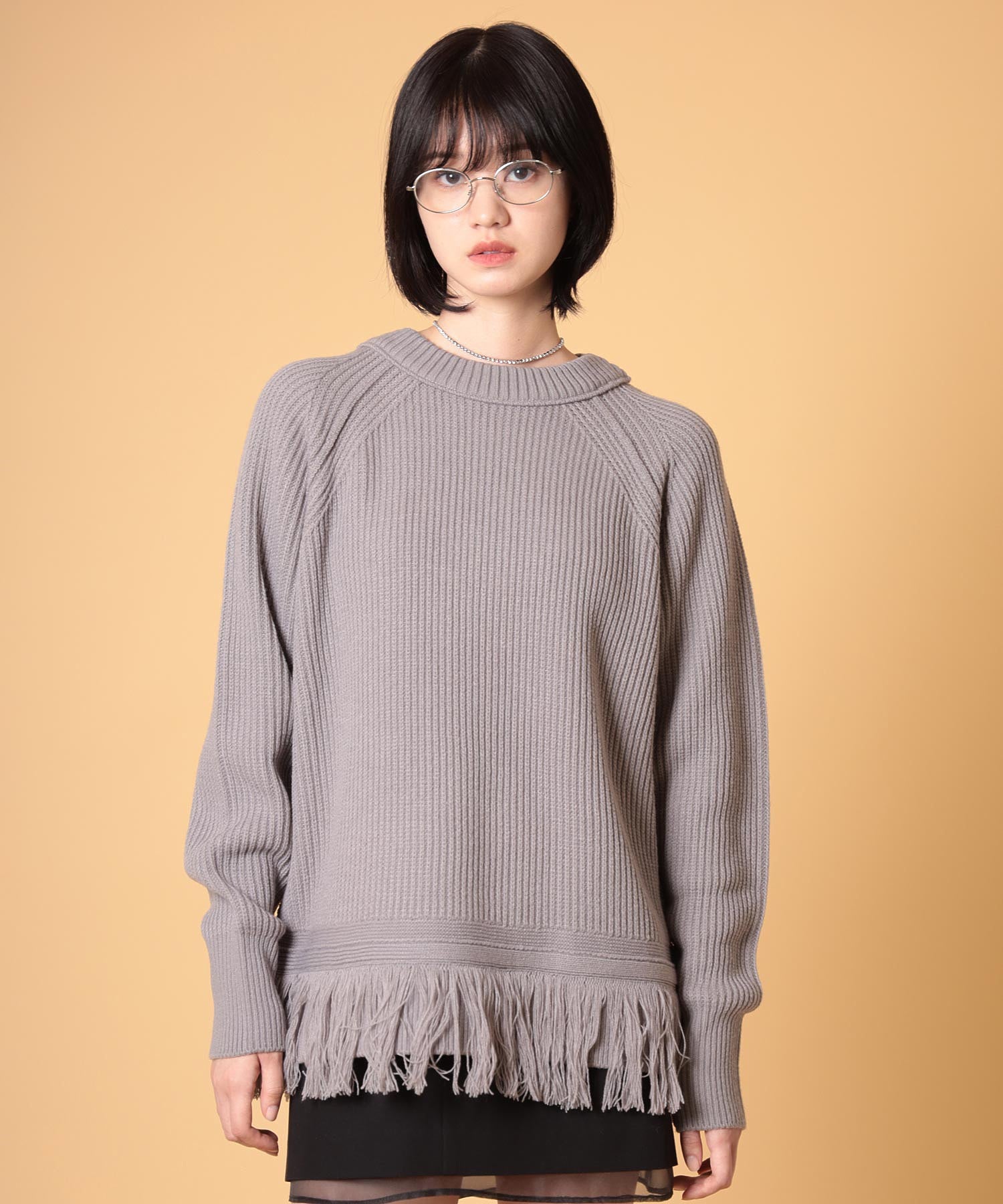 オーバーサイズフリンジニットプルオーバー