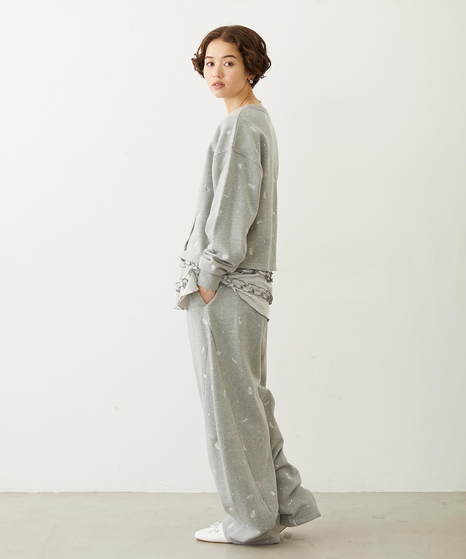 RUFFLE HEM L/S TOP
