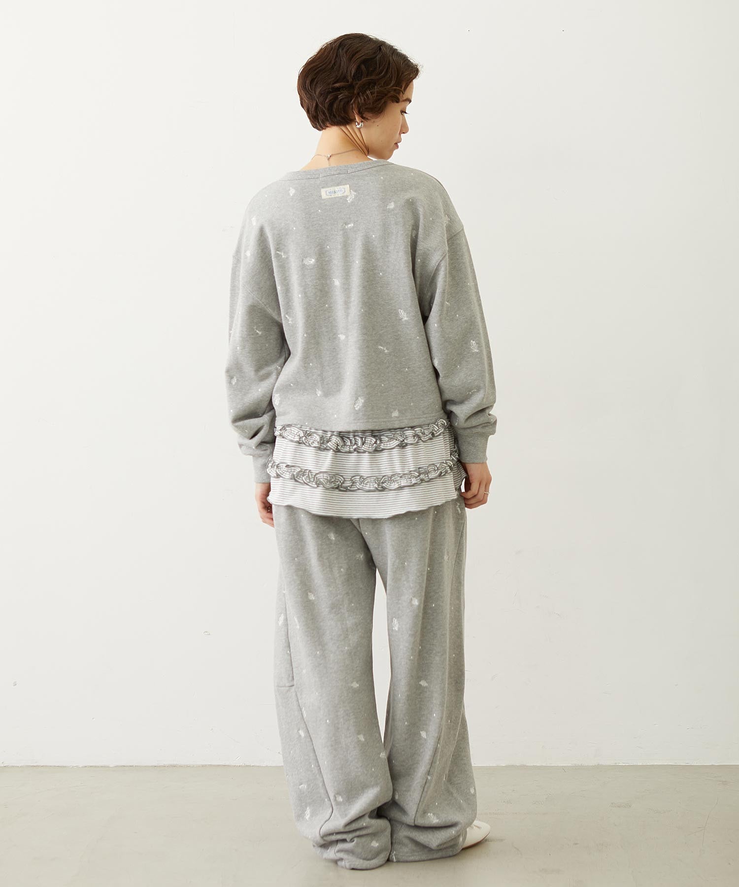 RUFFLE HEM L/S TOP