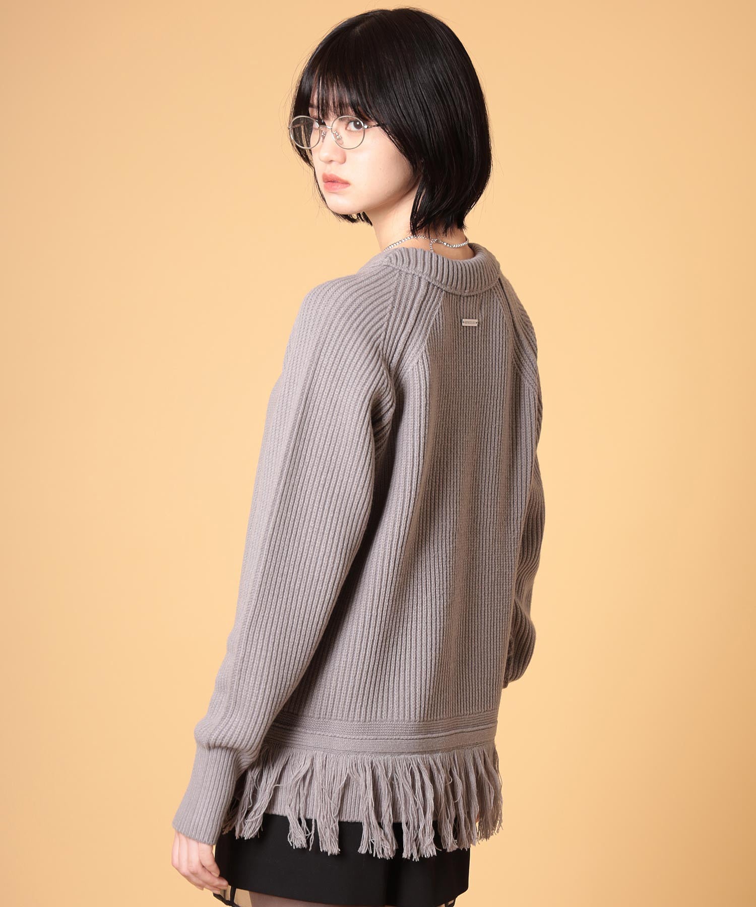 オーバーサイズフリンジニットプルオーバー