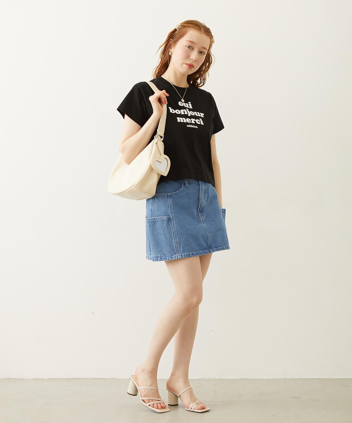 PANELED POCKET DENIM MINI SKIRT
