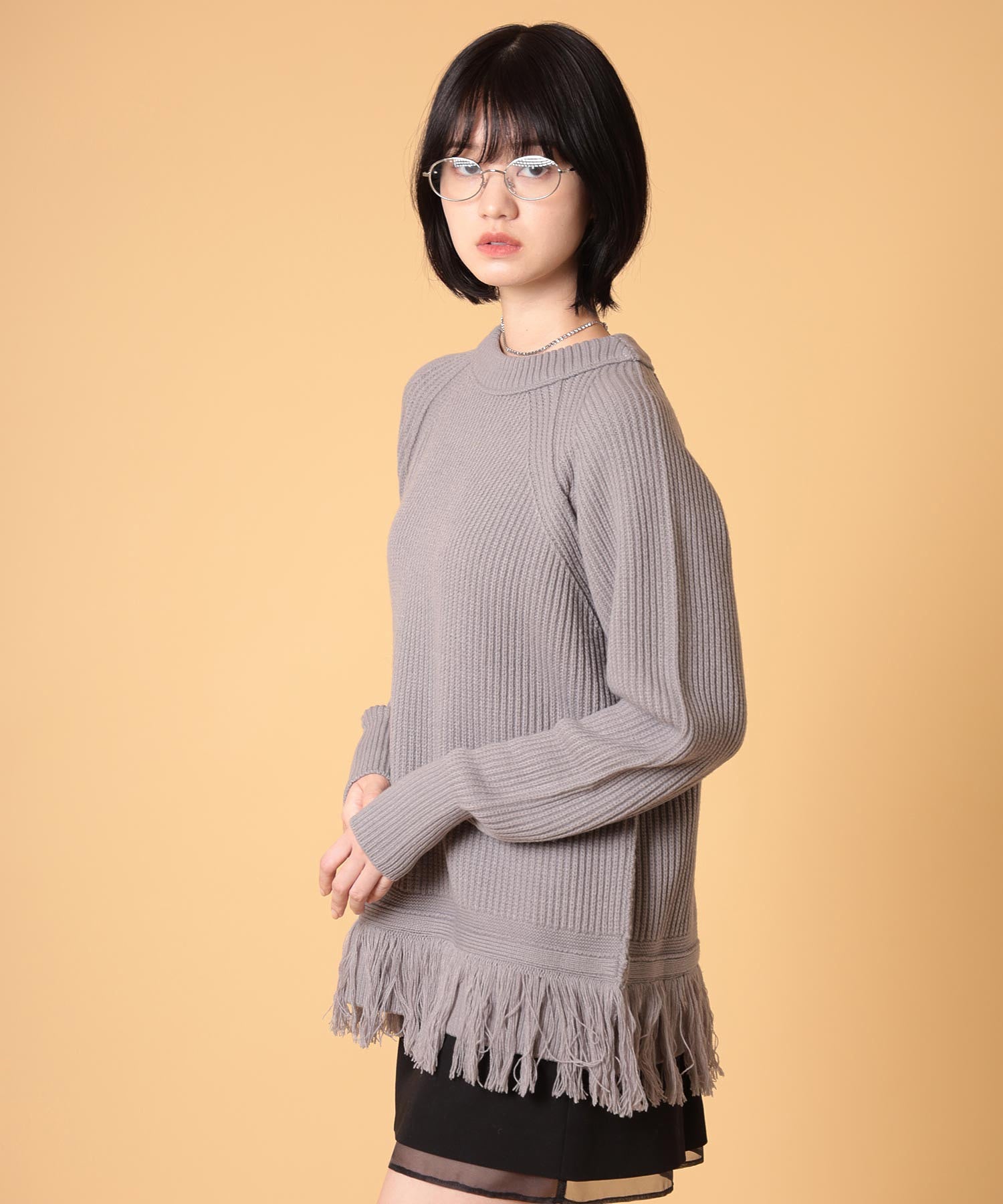 オーバーサイズフリンジニットプルオーバー