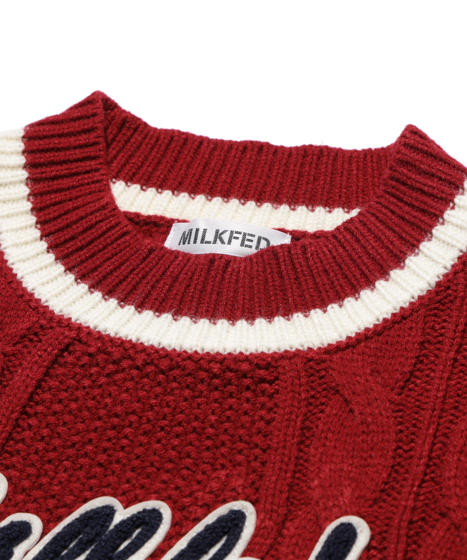 CRICKET KNIT PATCH TOP
