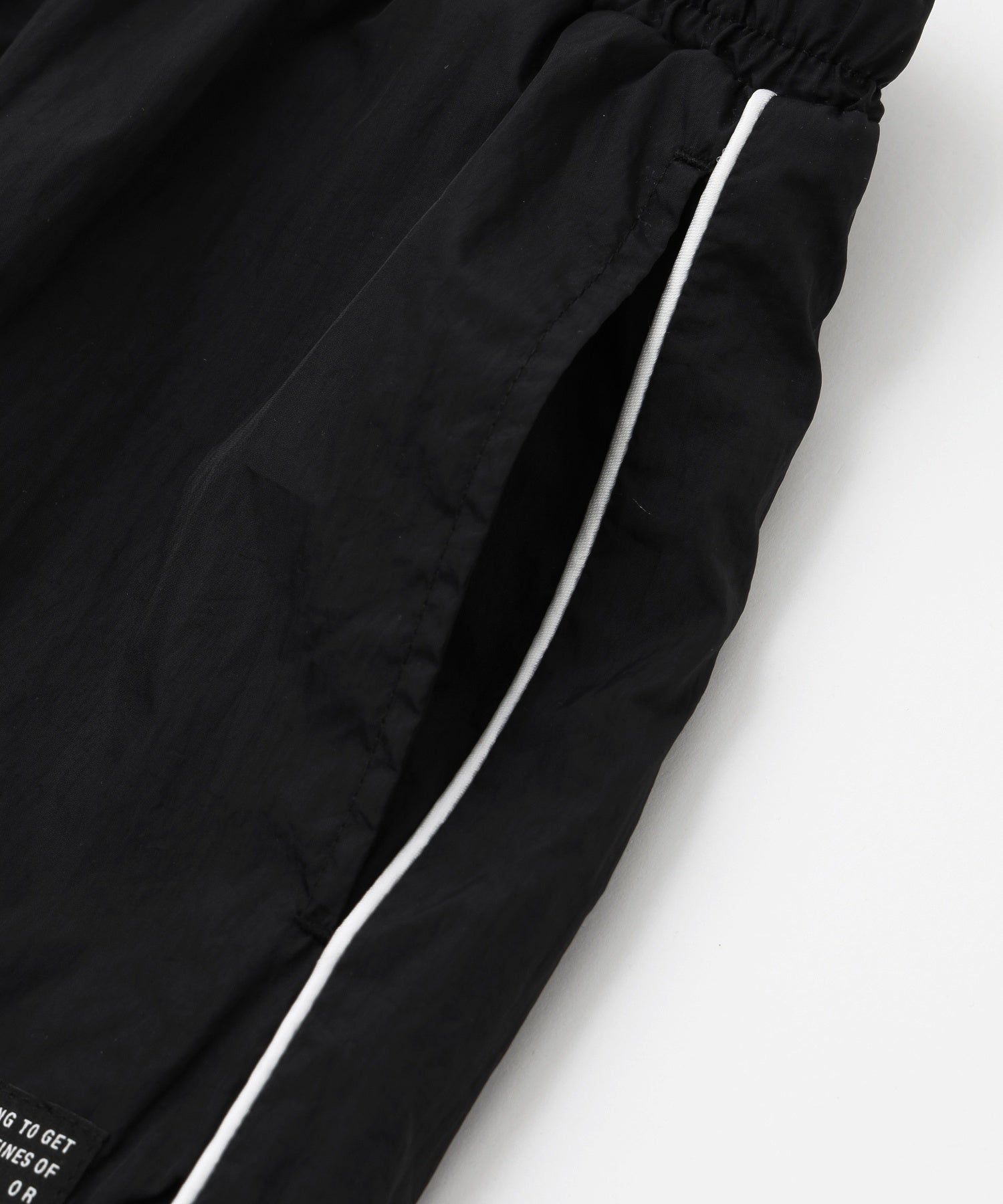 FACE LABEL TRACK PANTS