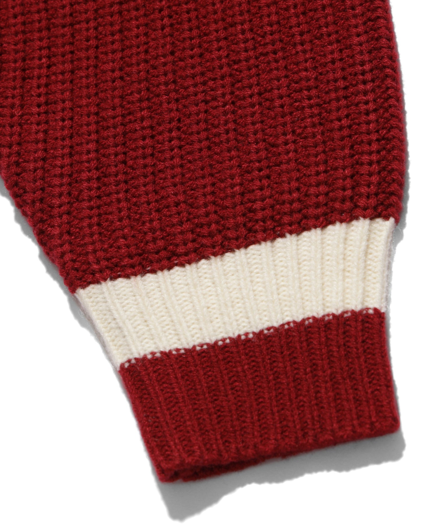 CRICKET KNIT PATCH TOP
