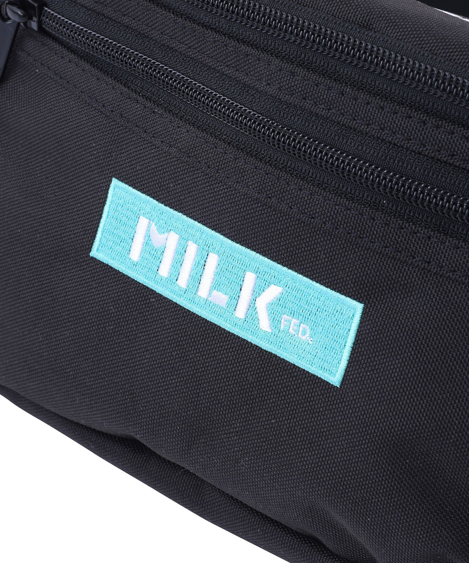 TOP LOGO FANNY PACK LIMITED COLOR MILKFED.
