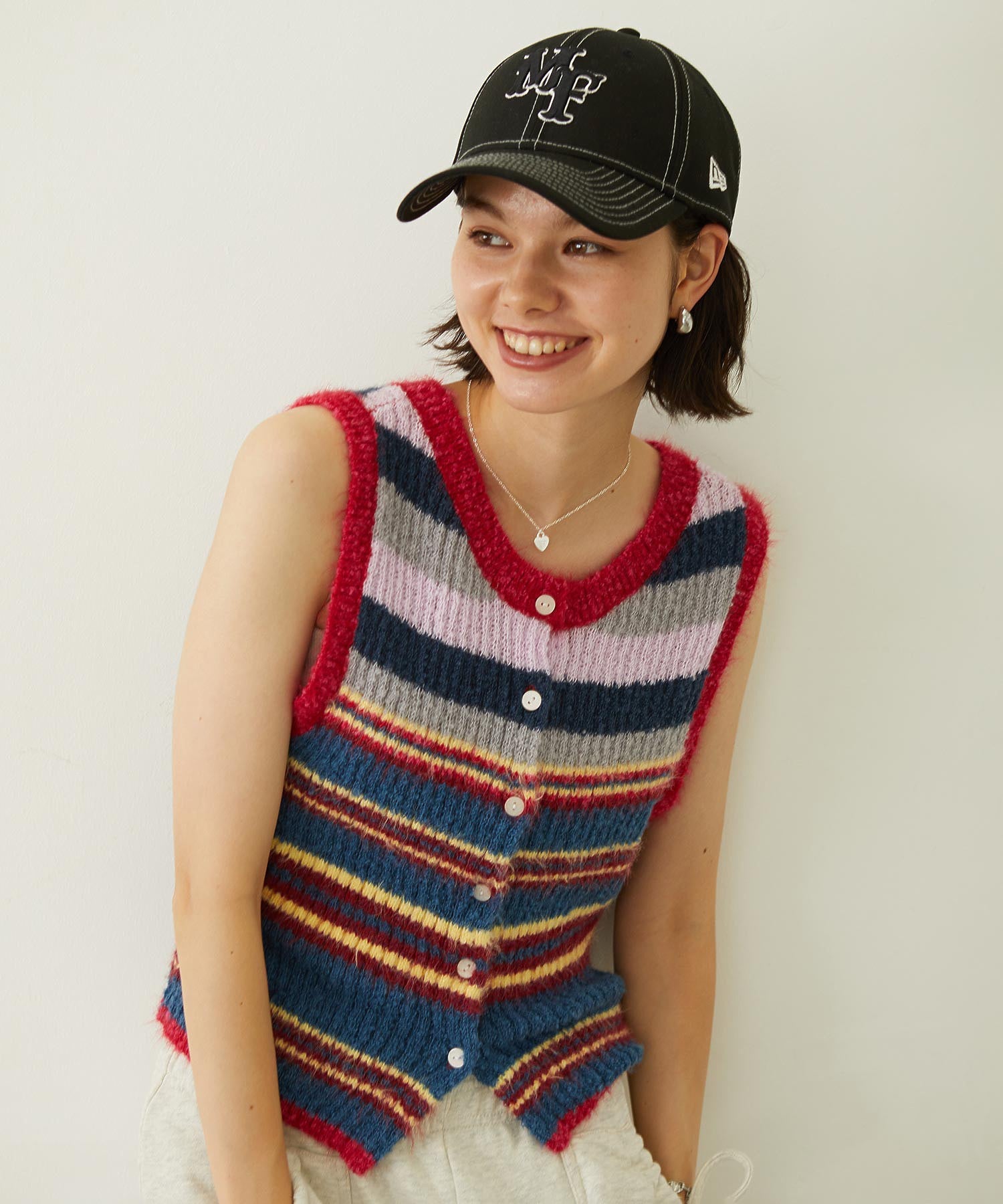 TWO-TYPE STRIPED KNIT VEST