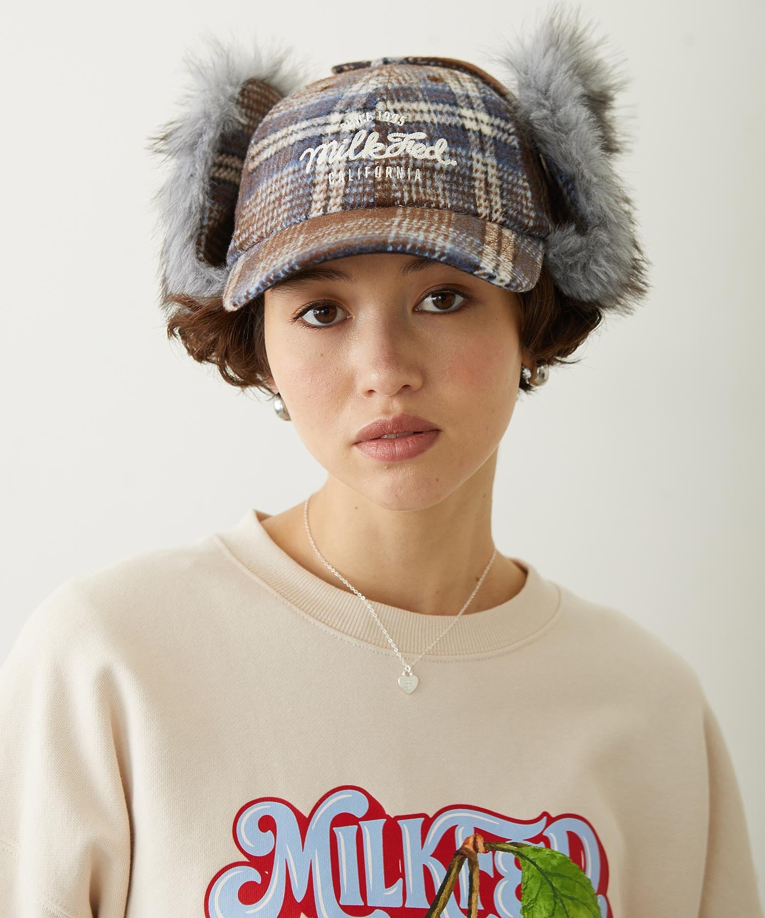 PLAID PATTERN FUR EAR FLAP