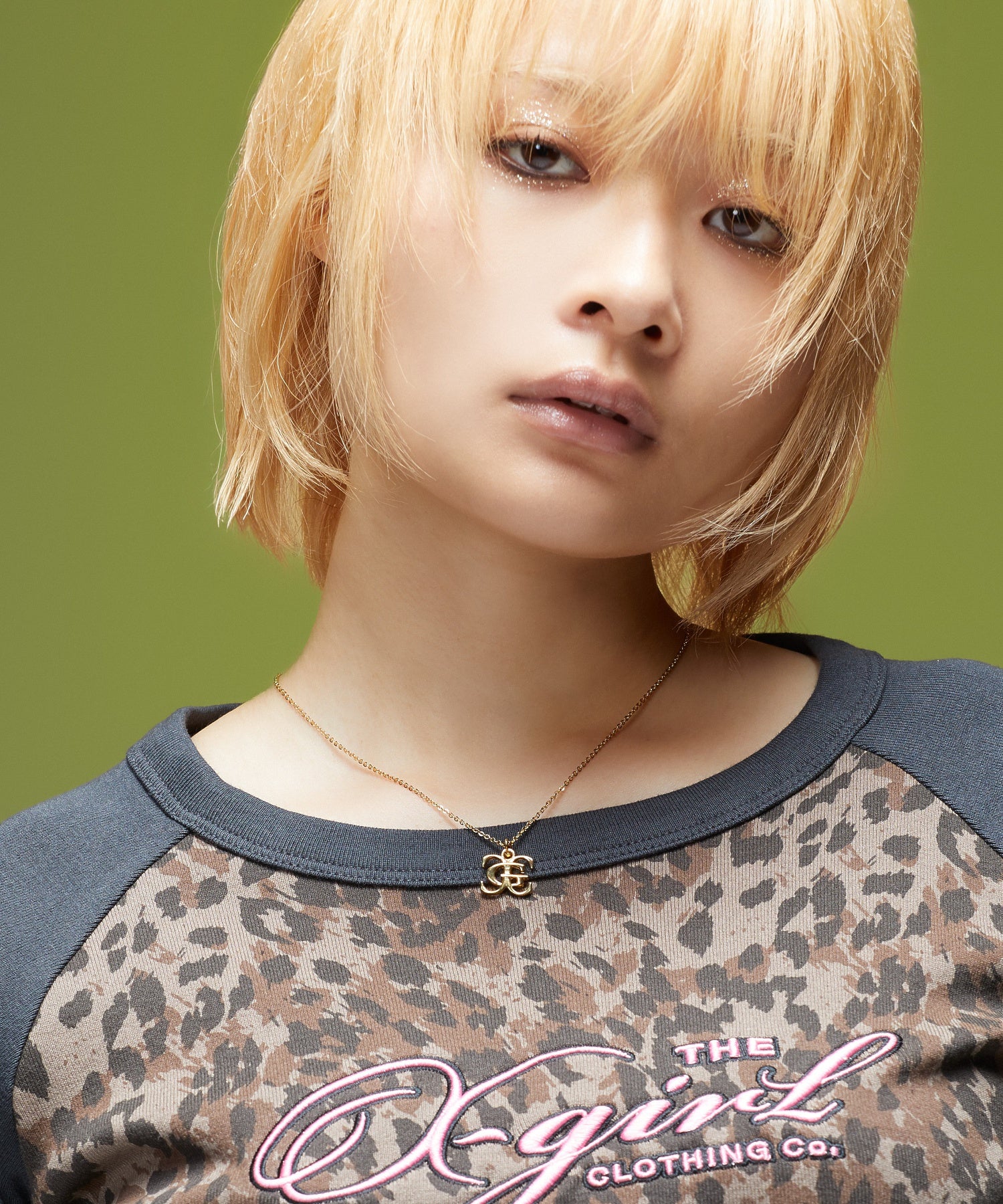 XG EMBLEM CHARM NECKLACE