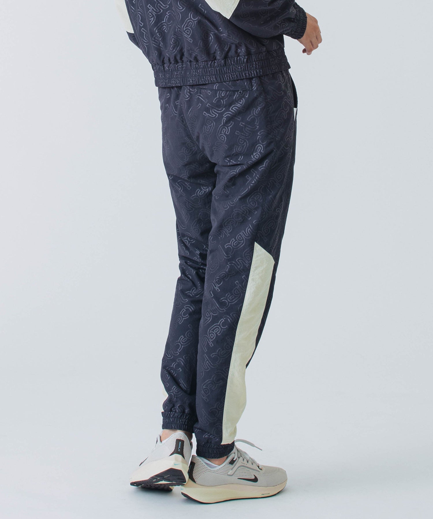 EMBOSSED WIND UP PANTS