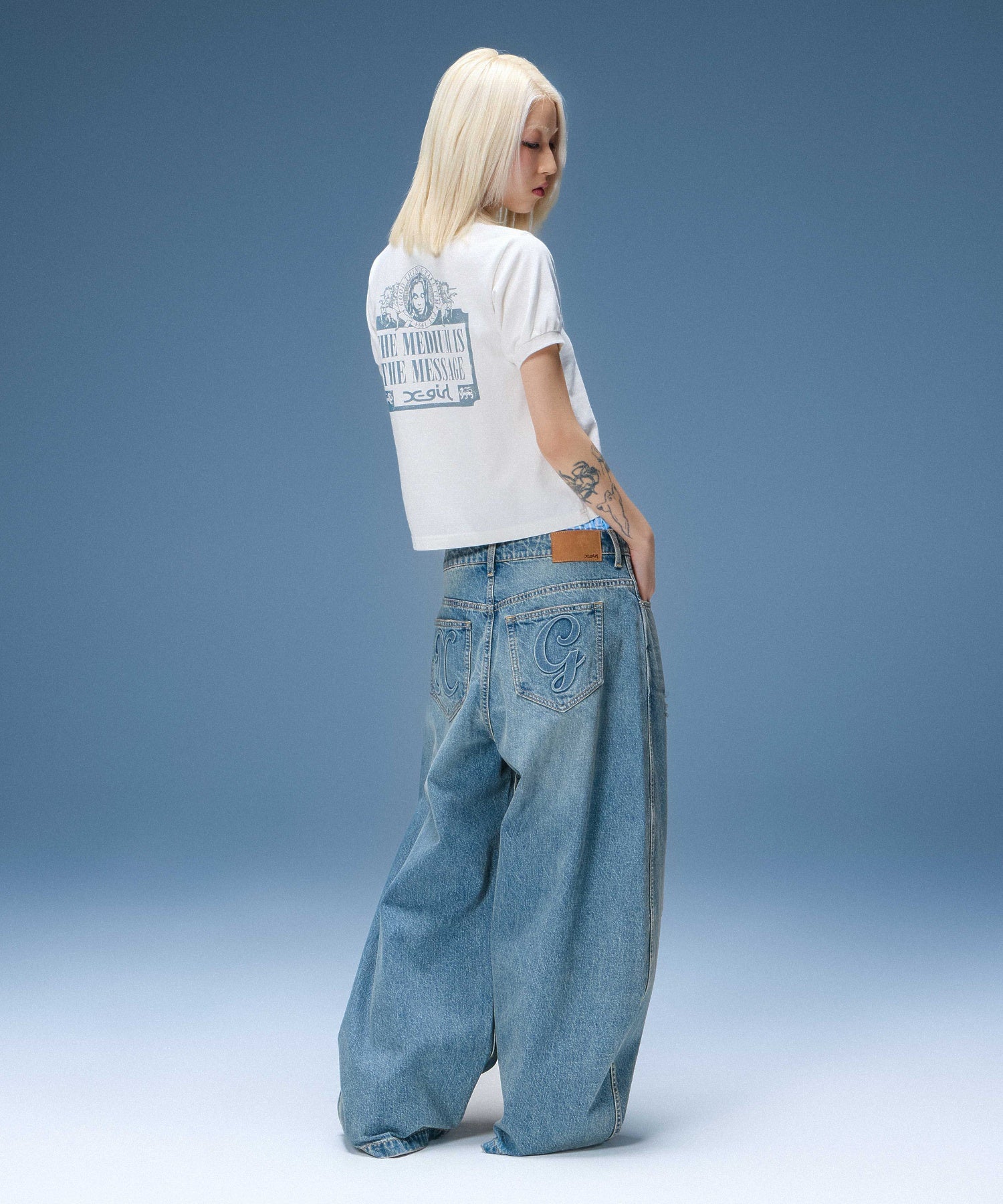 DISTRESSED BAGGY DENIM PANTS