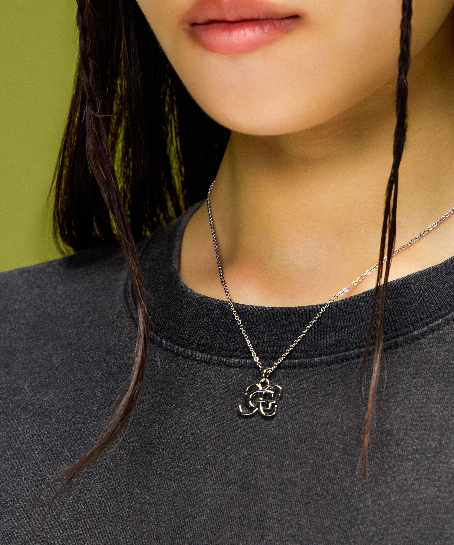 XG EMBLEM CHARM NECKLACE