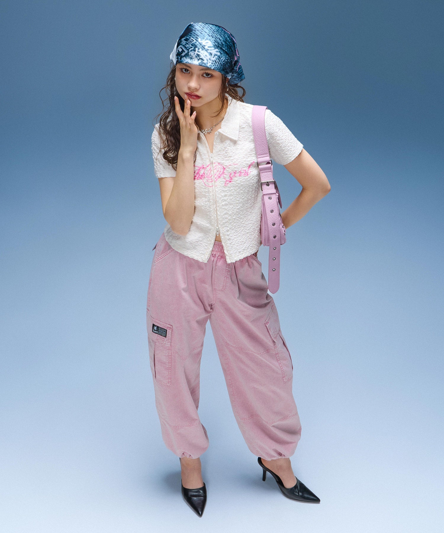 XG EMBLEM BUCKLE PANELED SHOULDER BAG