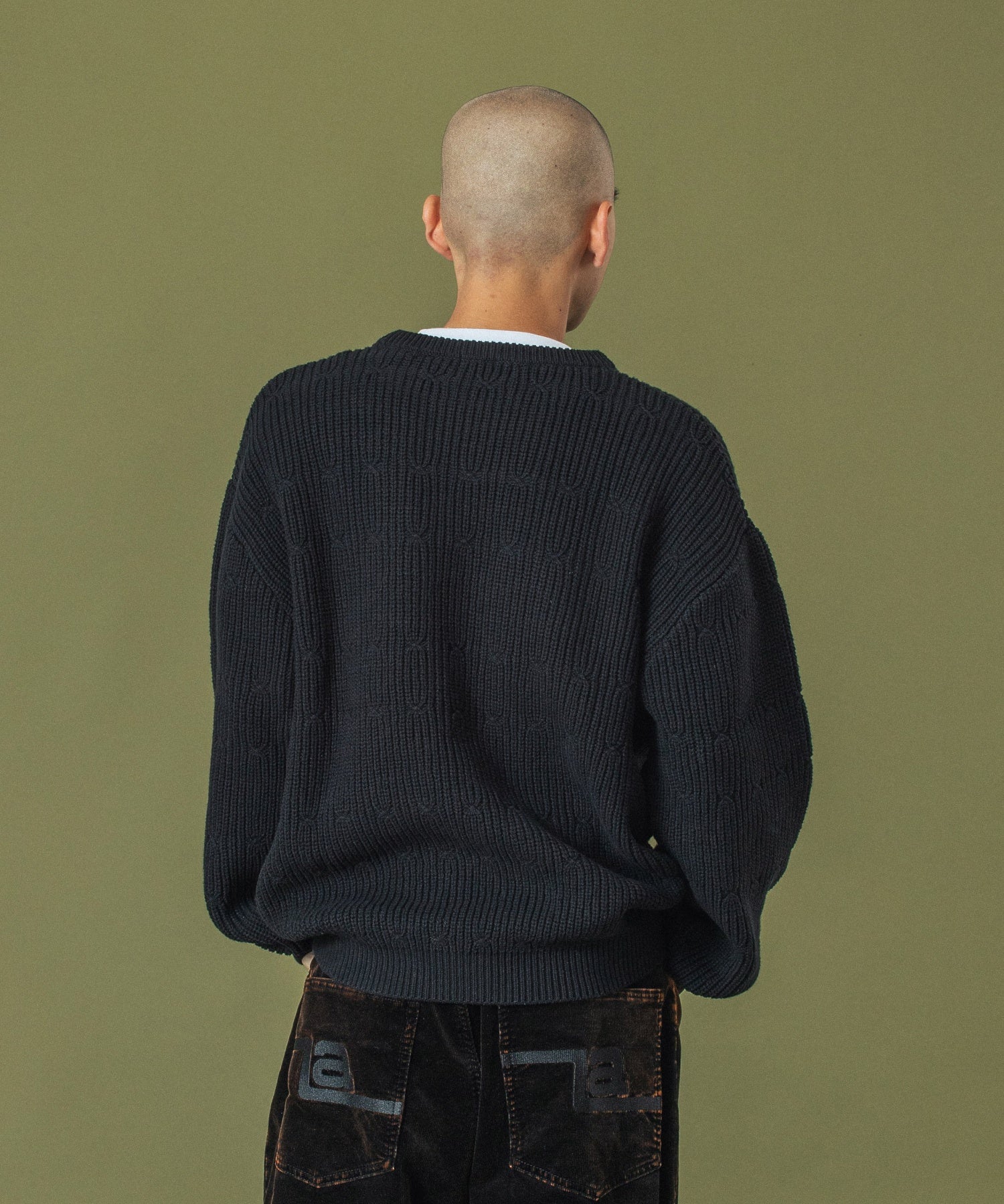 DEFORMED CABLE CREWNECK KNIT