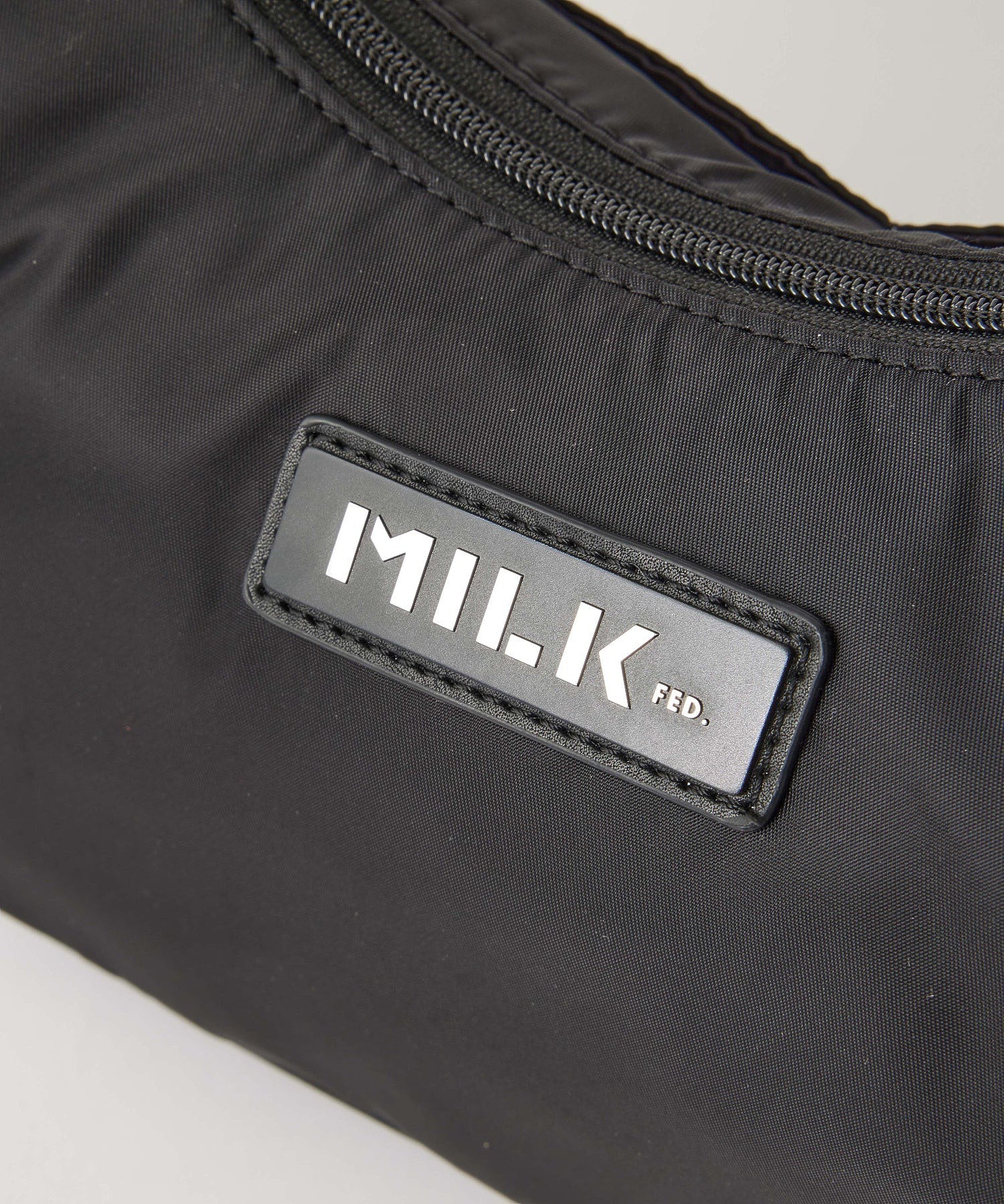 LOGO PLATE HANDBAG MILKFED.