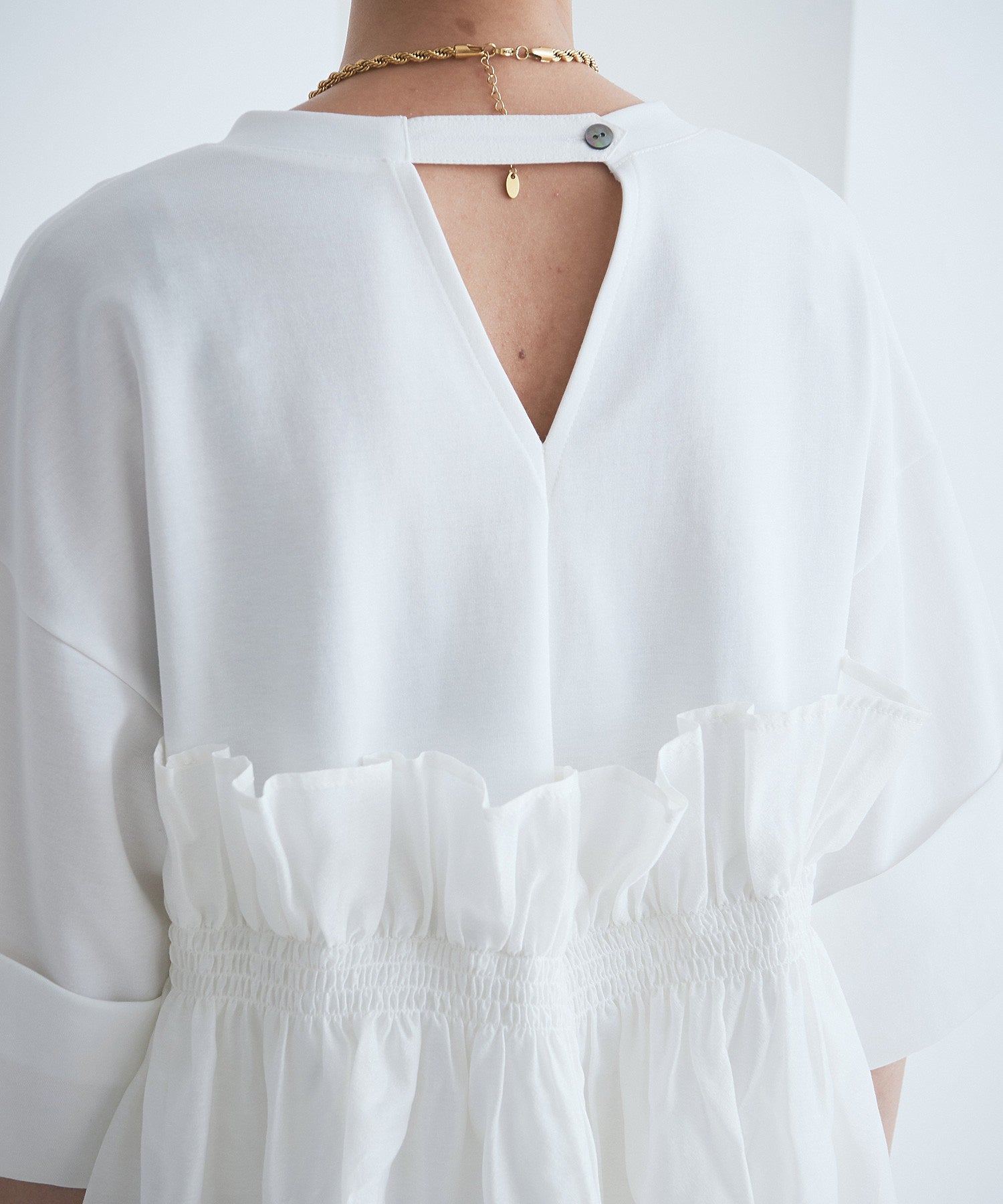 ドッキングフリルカットソー