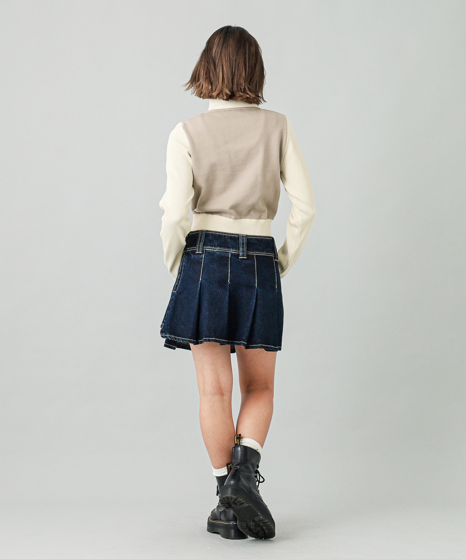 PLEATED DENIM MINI SKIRT