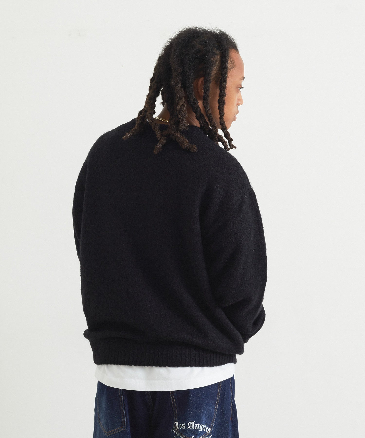 FLUID LETTERING CREW SWEATER