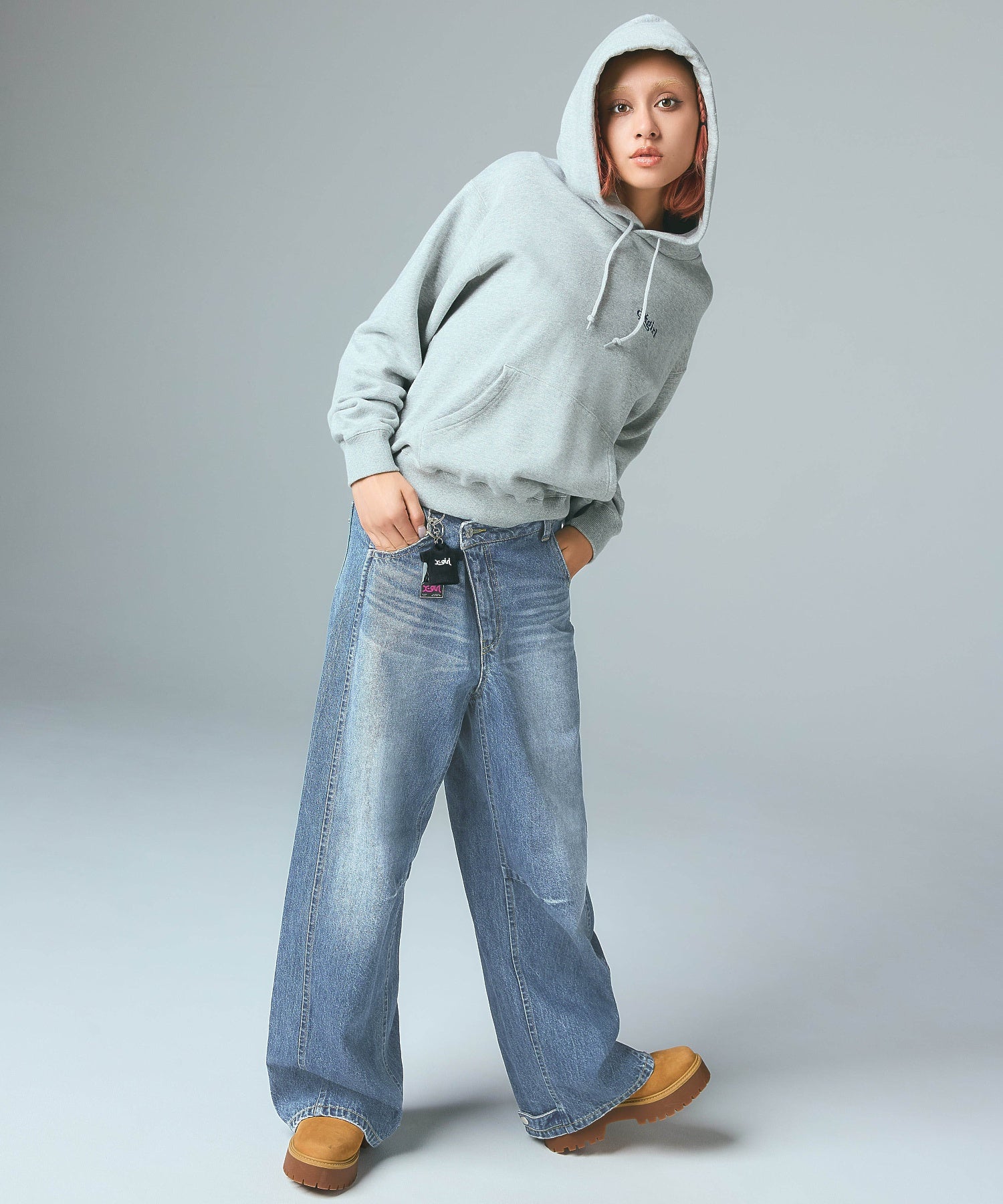 ASYMMETRIC WAIST BARREL LEG DENIM PANTS